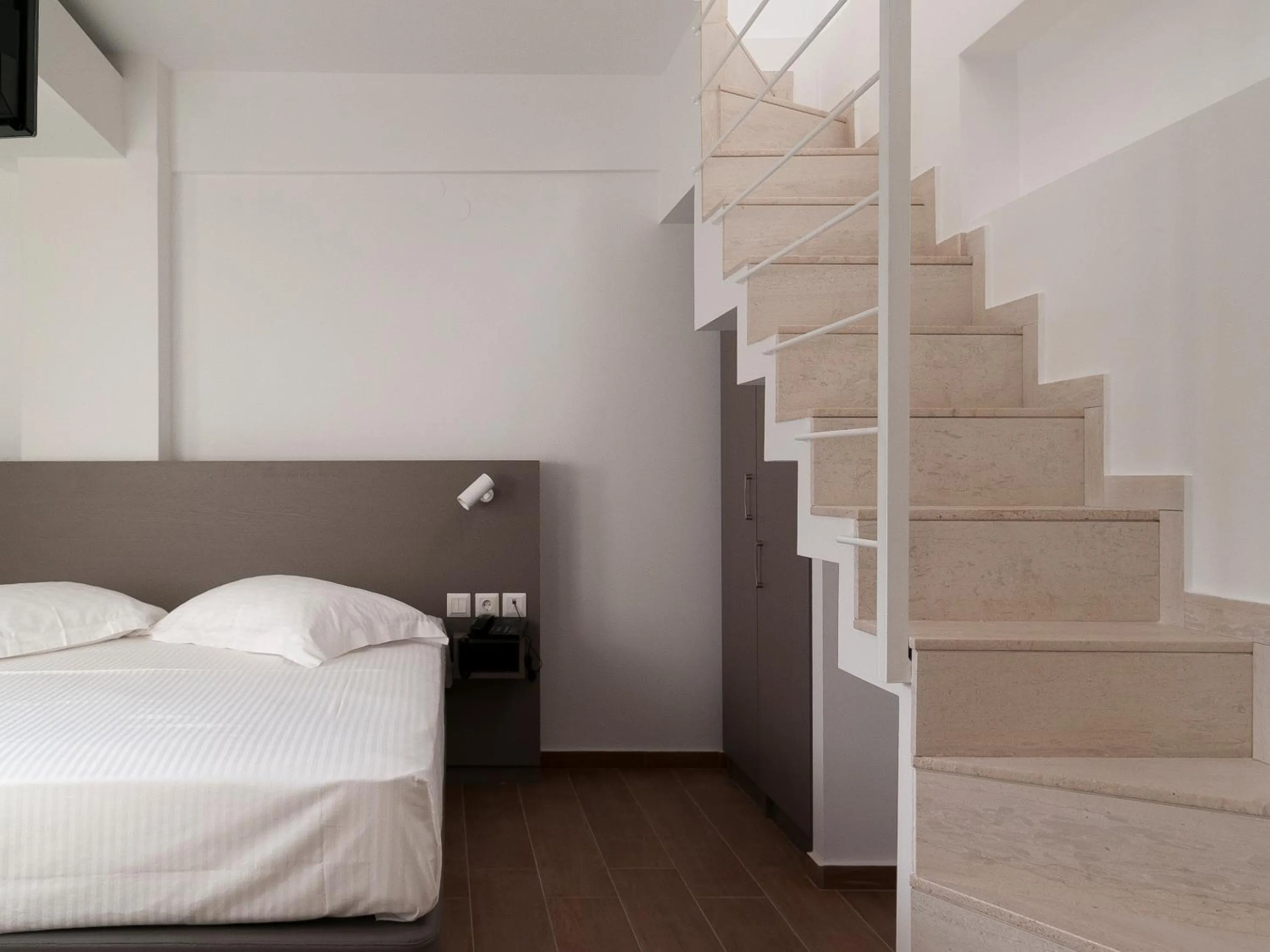 Bed in Olympos Suites Apartments