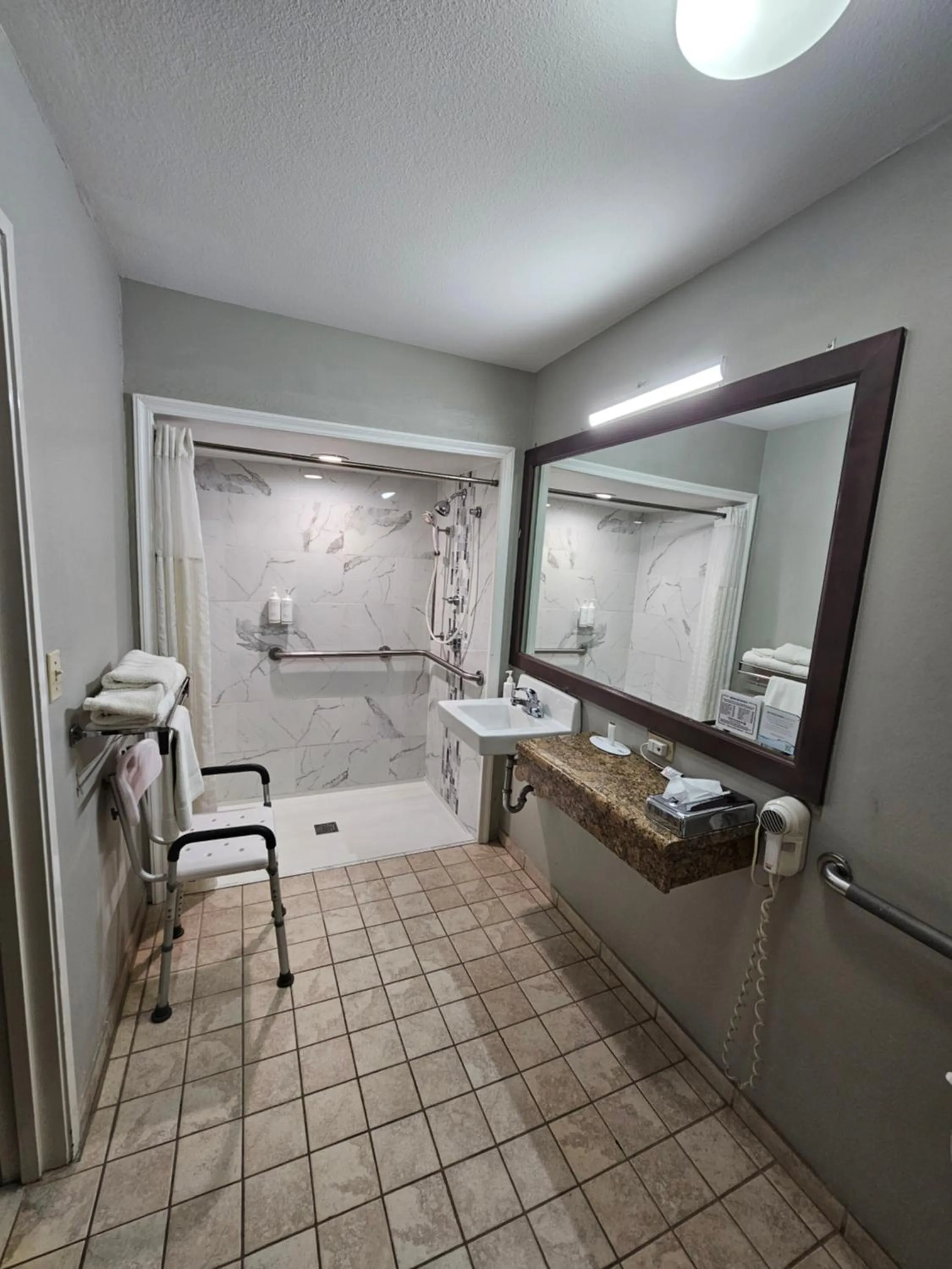 Bathroom in Super 8 by Wyndham McGehee