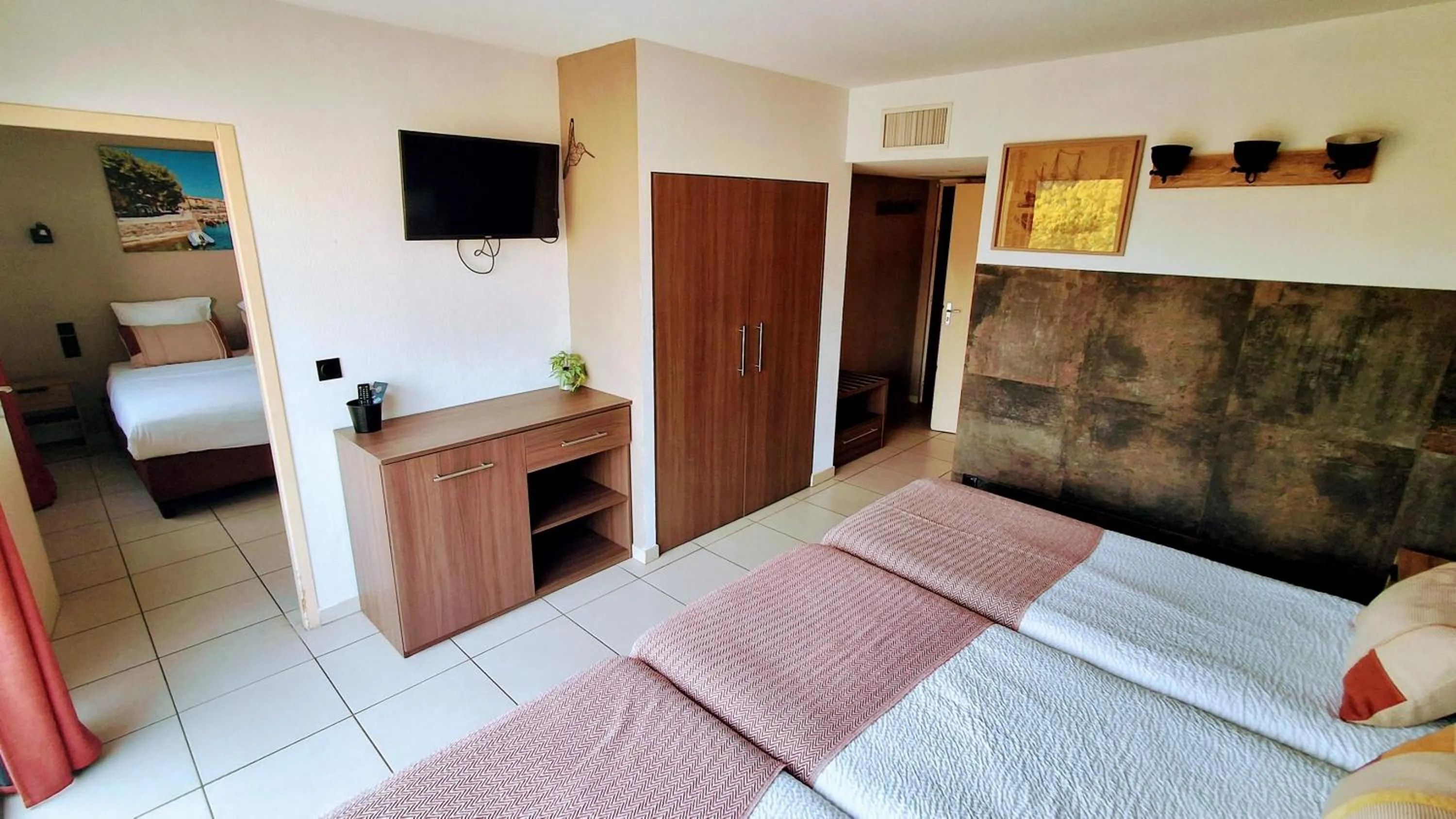 Photo of the whole room, Bed in Hôtel Le Maritime