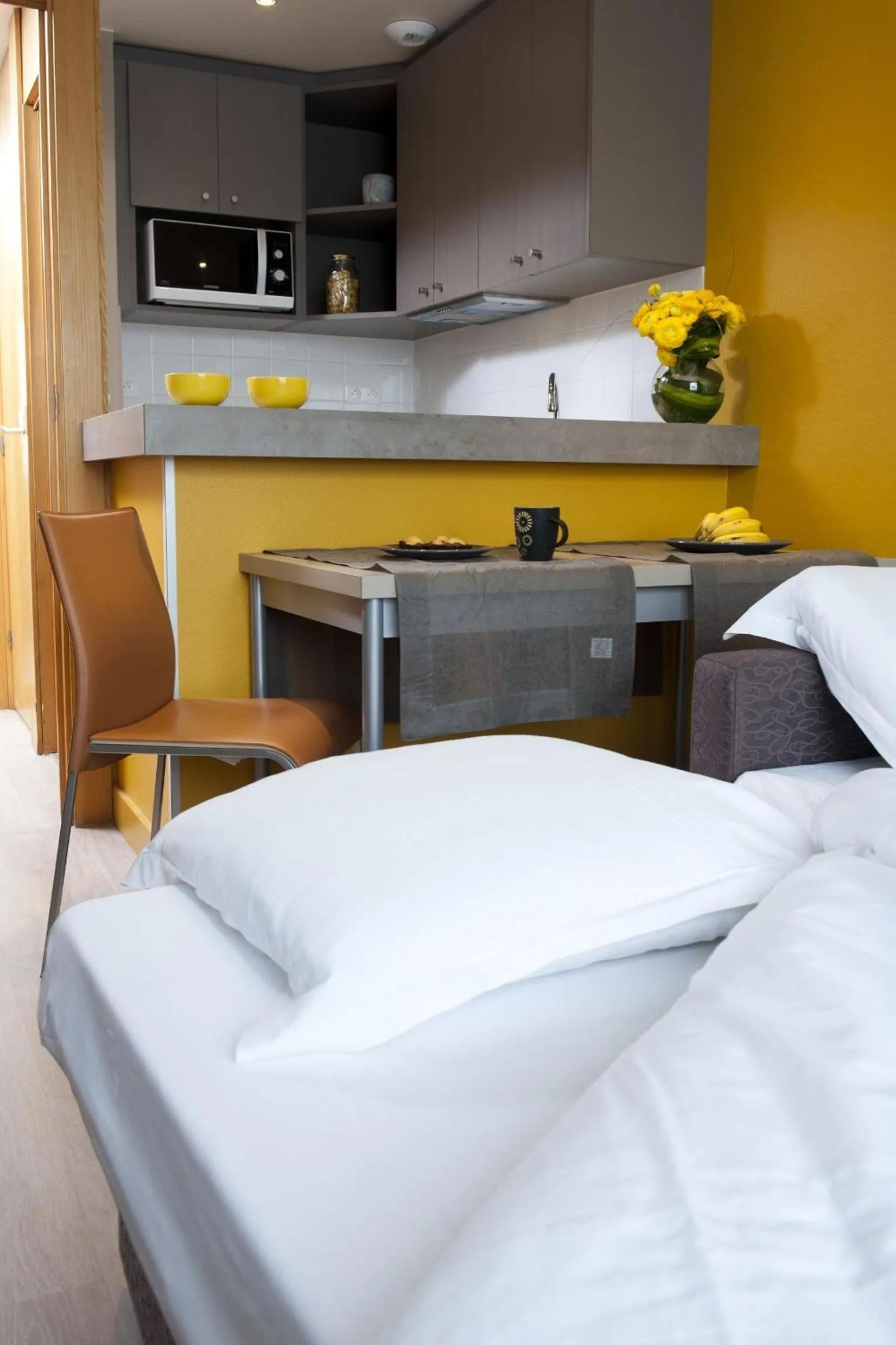 Kitchen or kitchenette, Bed in Aparthotel Adagio Paris XV