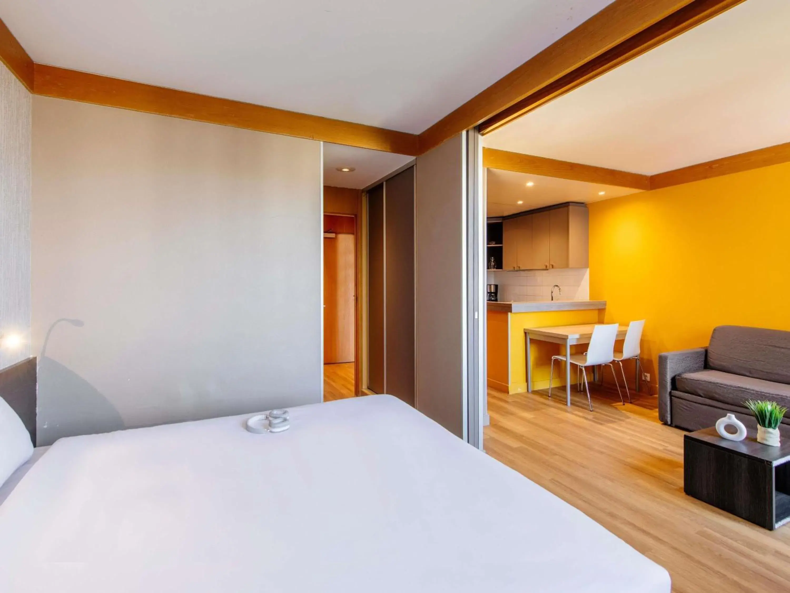 Bedroom, Bed in Aparthotel Adagio Paris XV Bedroom, Bed in Aparthotel Adagio Paris XV