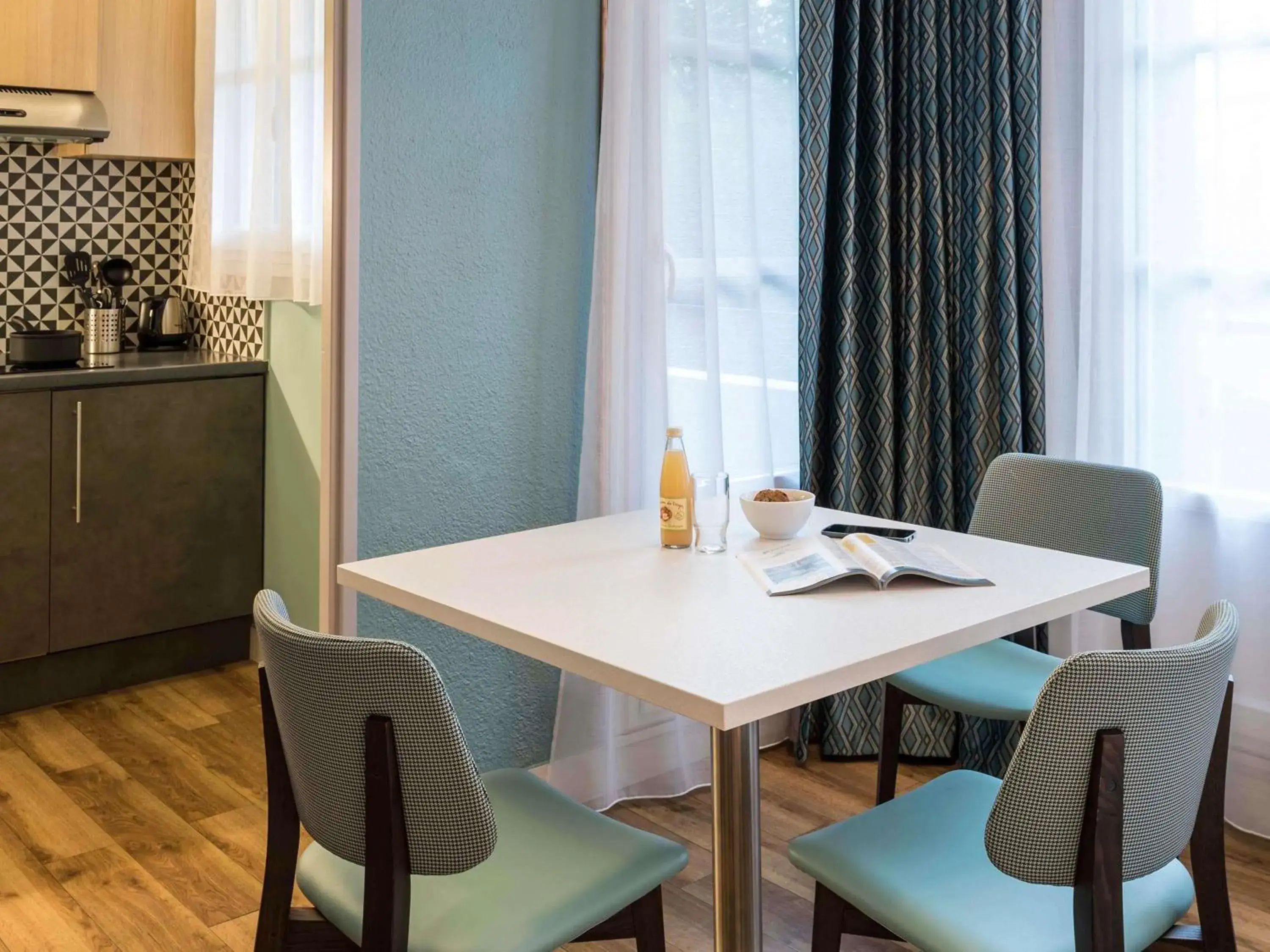 Bedroom in Aparthotel Adagio Paris Montmartre Bedroom in Aparthotel Adagio Paris Montmartre