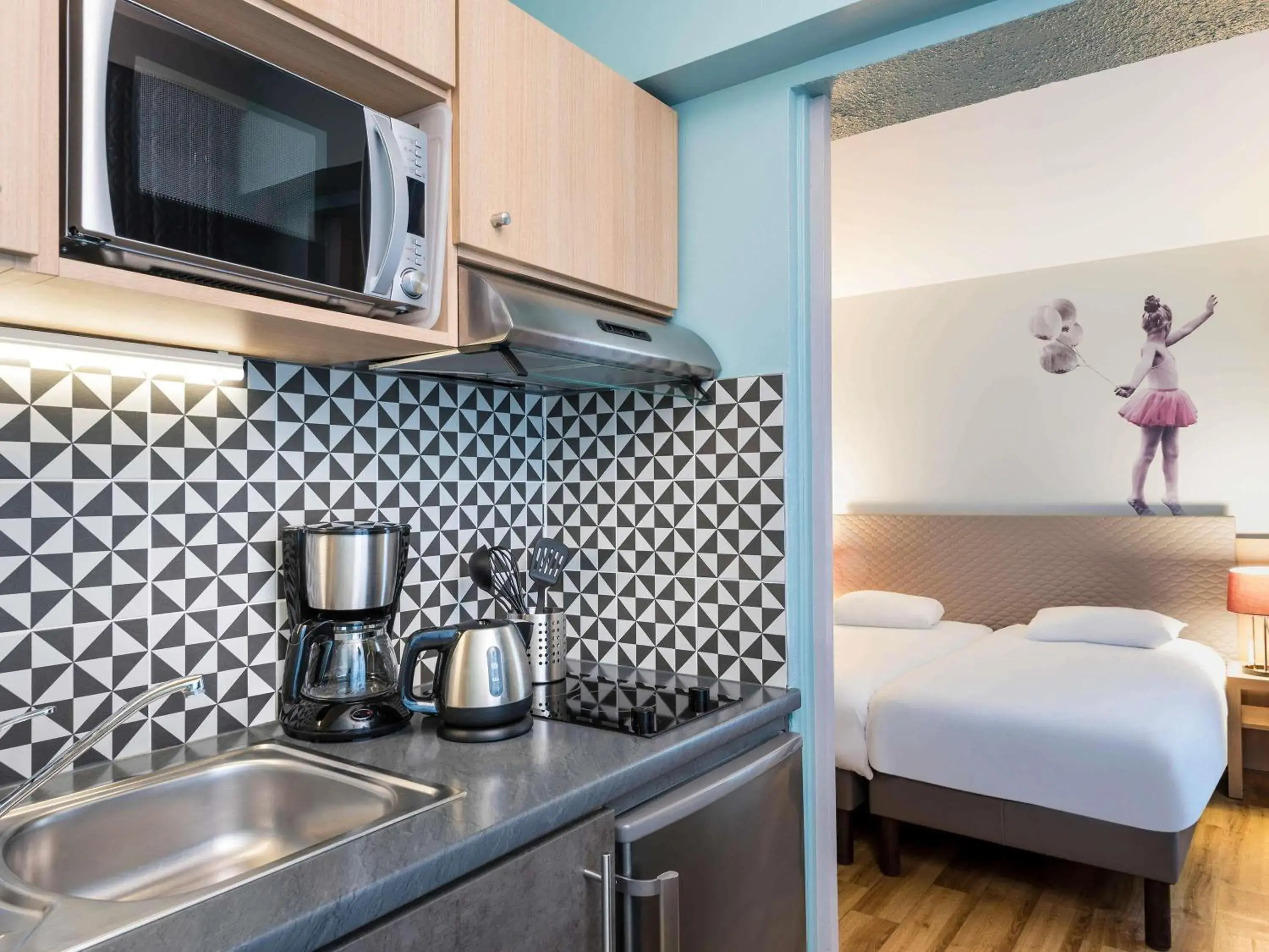 Bedroom, Bed in Aparthotel Adagio Paris Montmartre Bedroom, Bed in Aparthotel Adagio Paris Montmartre