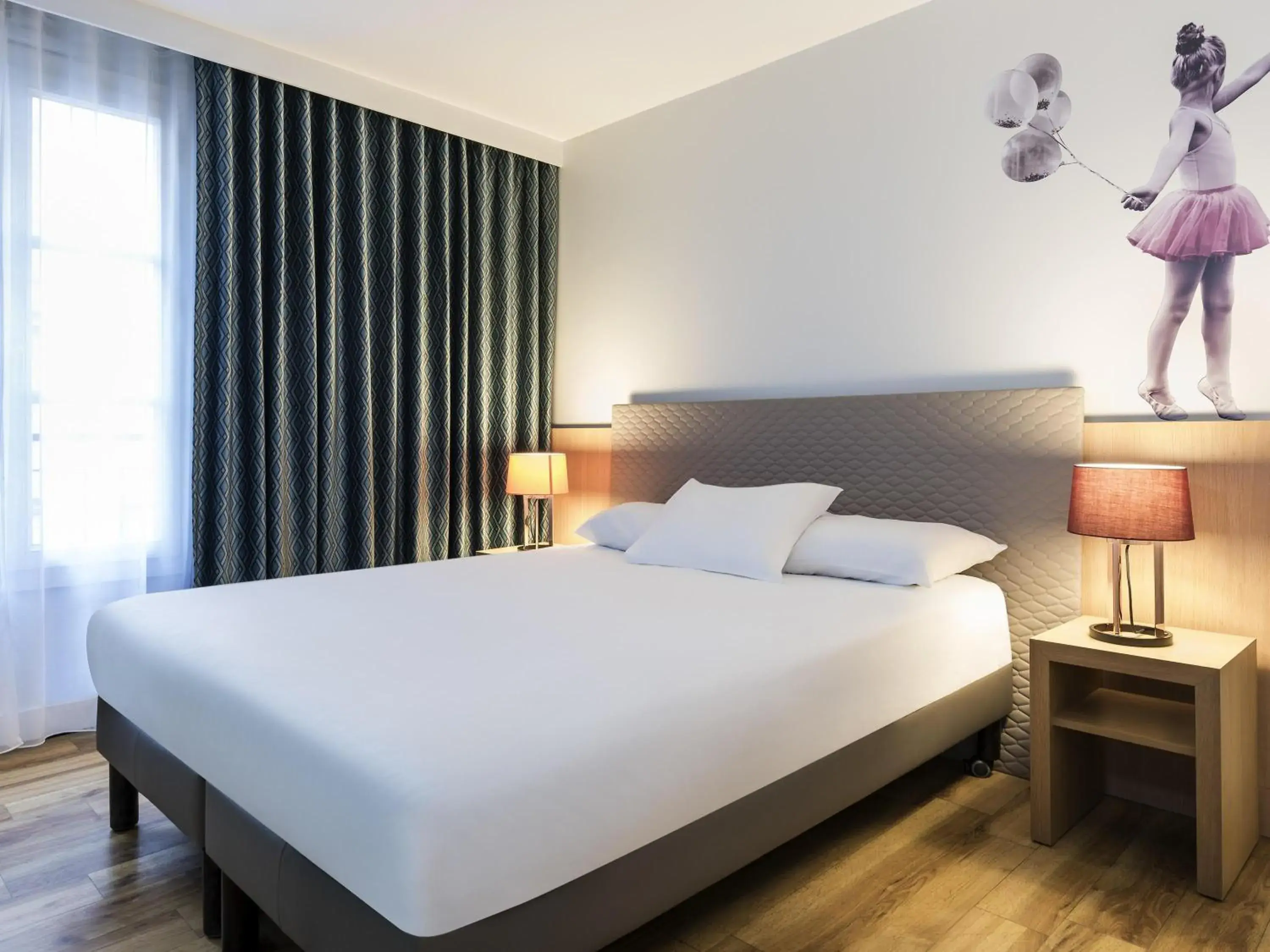 Bedroom, Bed in Aparthotel Adagio Paris Montmartre Bedroom, Bed in Aparthotel Adagio Paris Montmartre