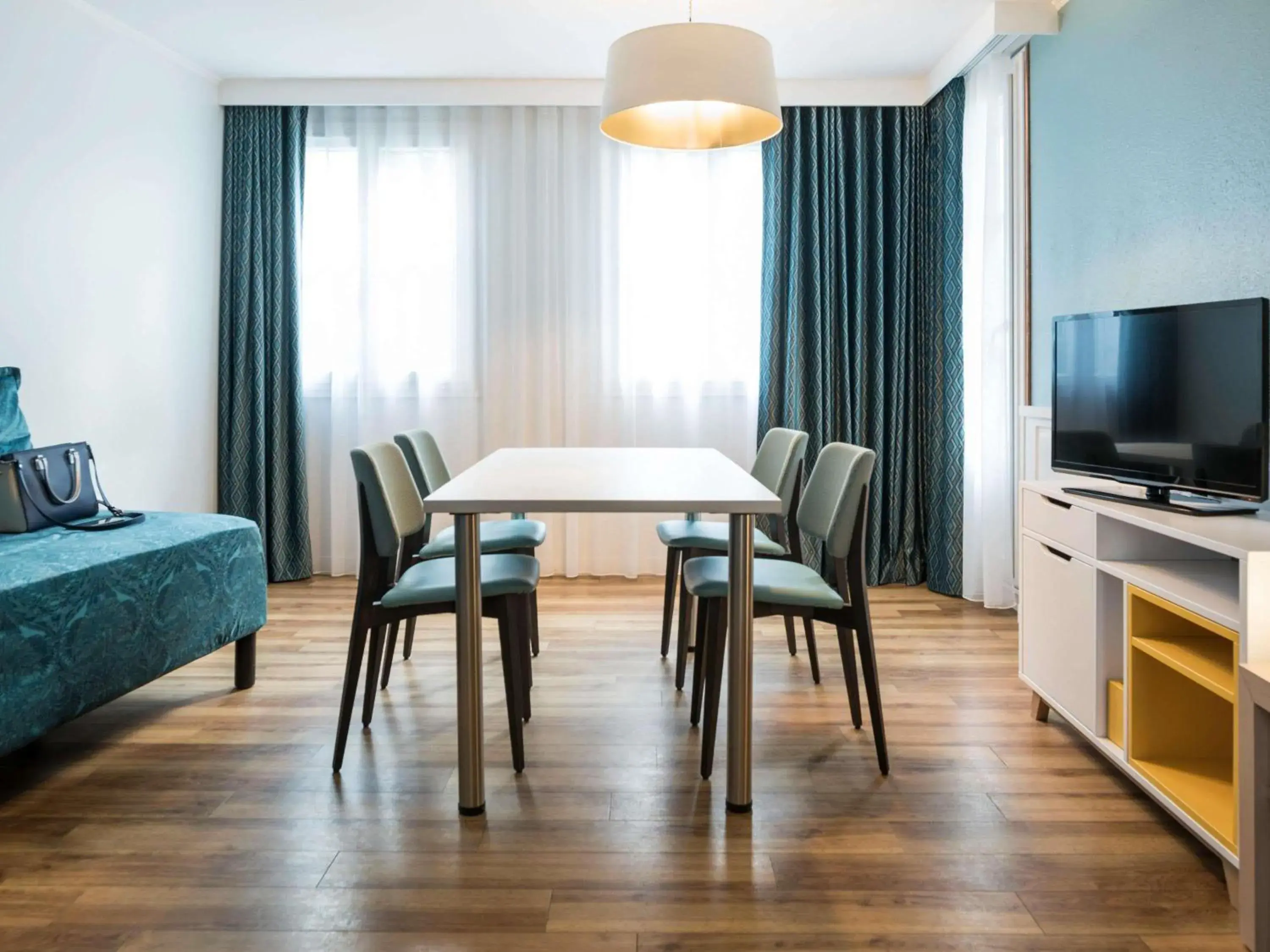 Bedroom in Aparthotel Adagio Paris Montmartre Bedroom in Aparthotel Adagio Paris Montmartre