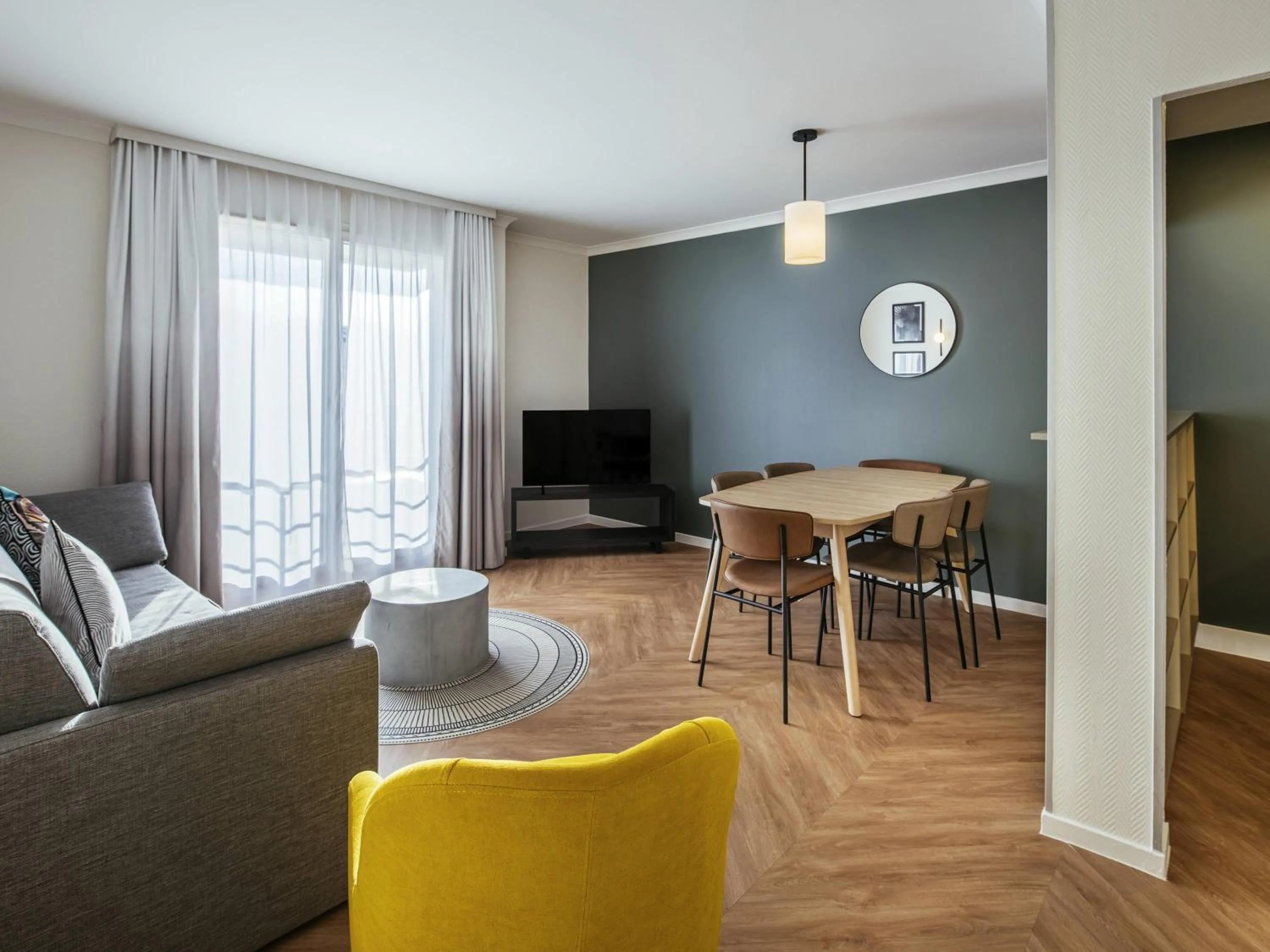 Bedroom in Aparthotel Adagio Paris Buttes Chaumont