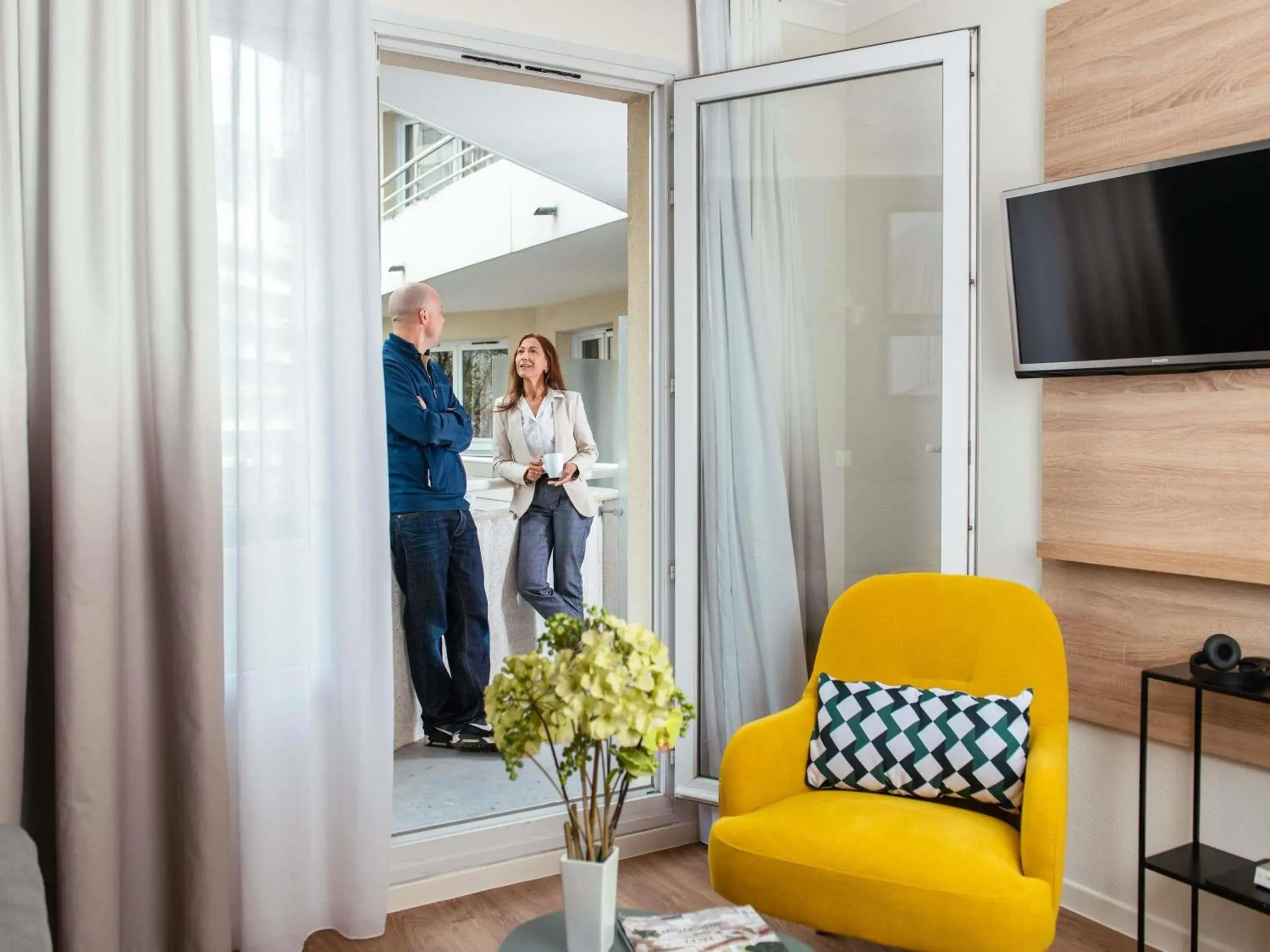Bedroom in Aparthotel Adagio La Défense Le Parc Bedroom in Aparthotel Adagio La Défense Le Parc