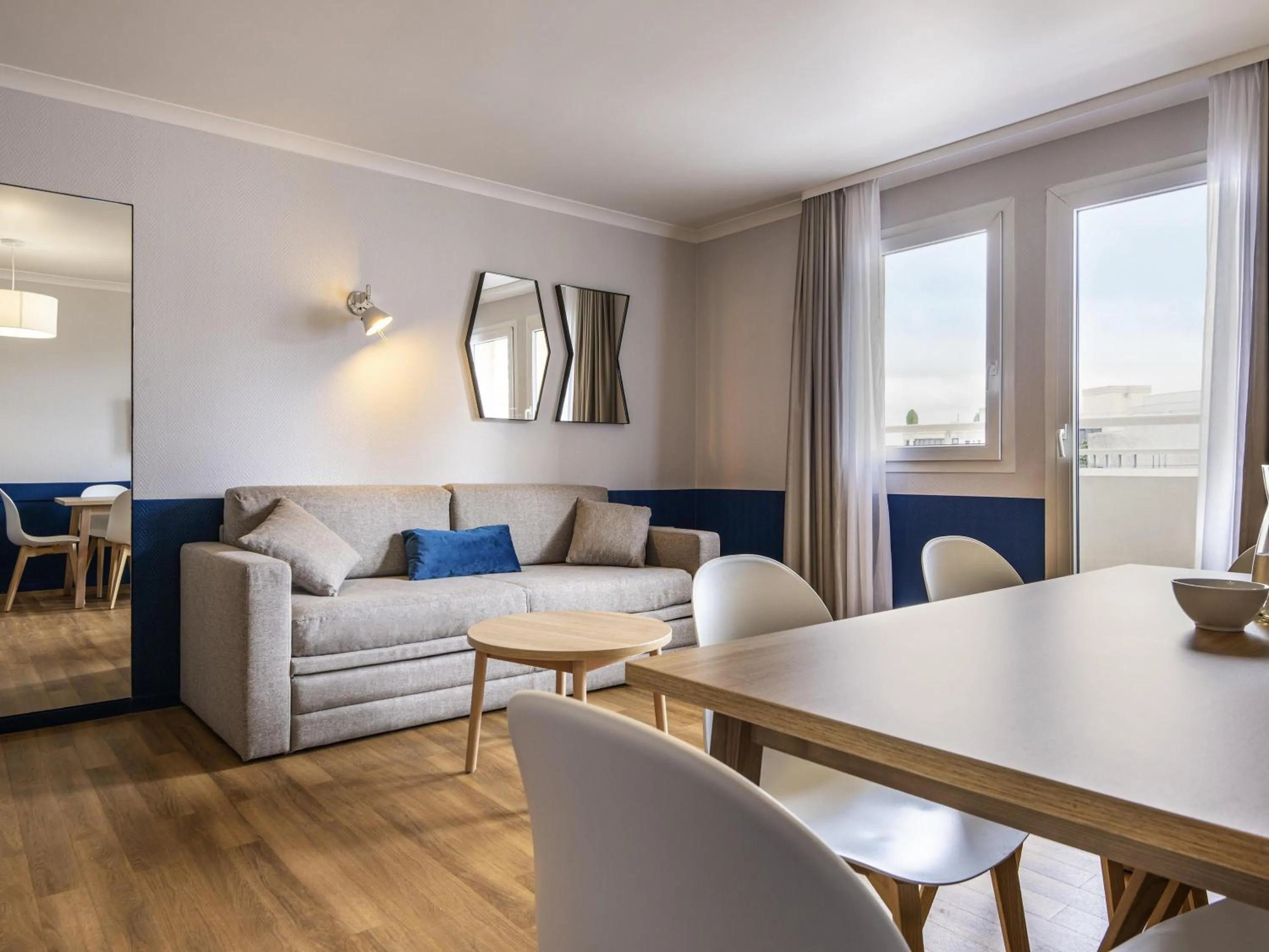 Bedroom in Aparthotel Adagio La Défense Kléber