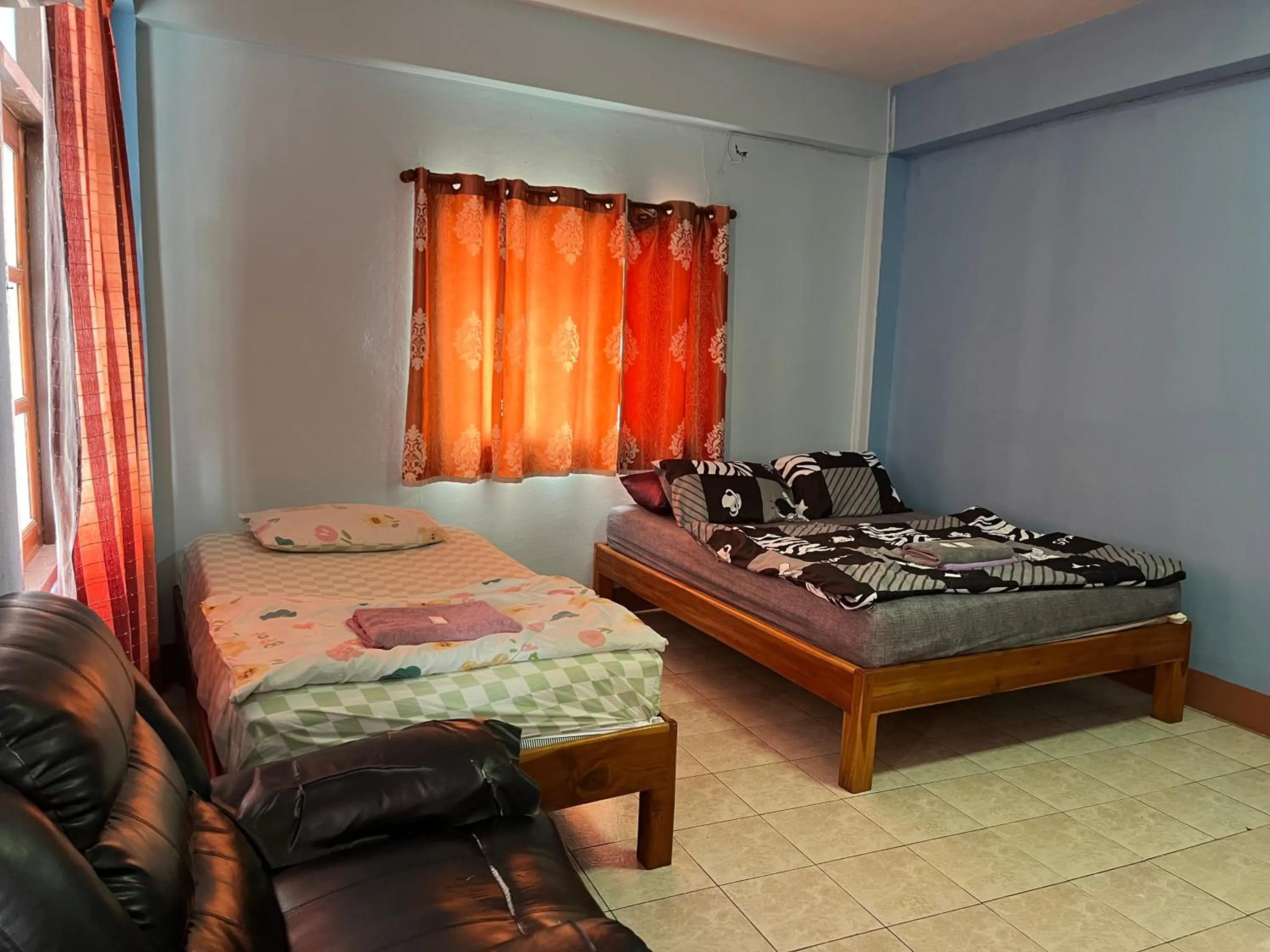 Photo of the whole room, Bed in Baan Picha 2