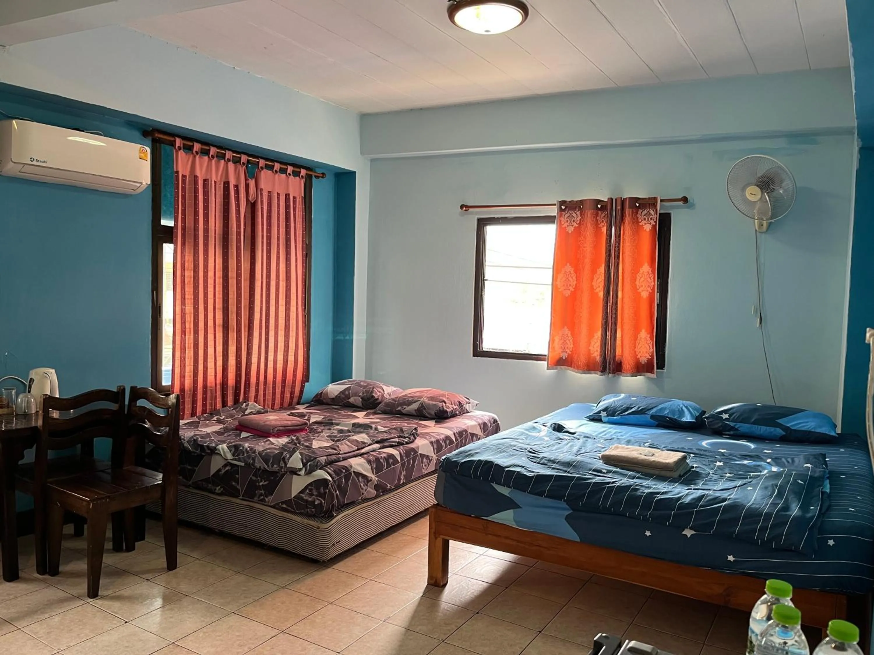 Photo of the whole room, Bed in Baan Picha 2