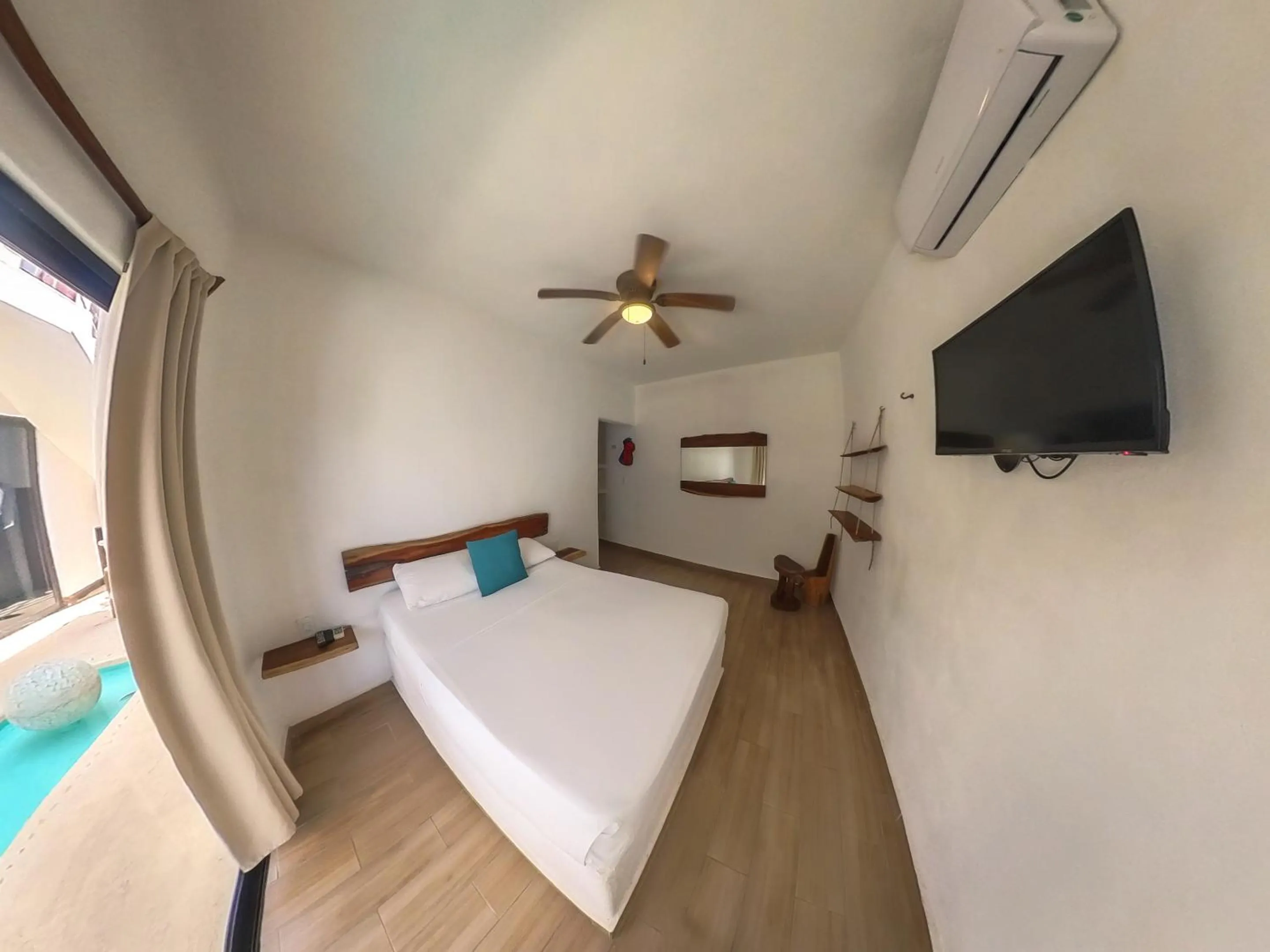 Bed in Ade Hotel Bacalar