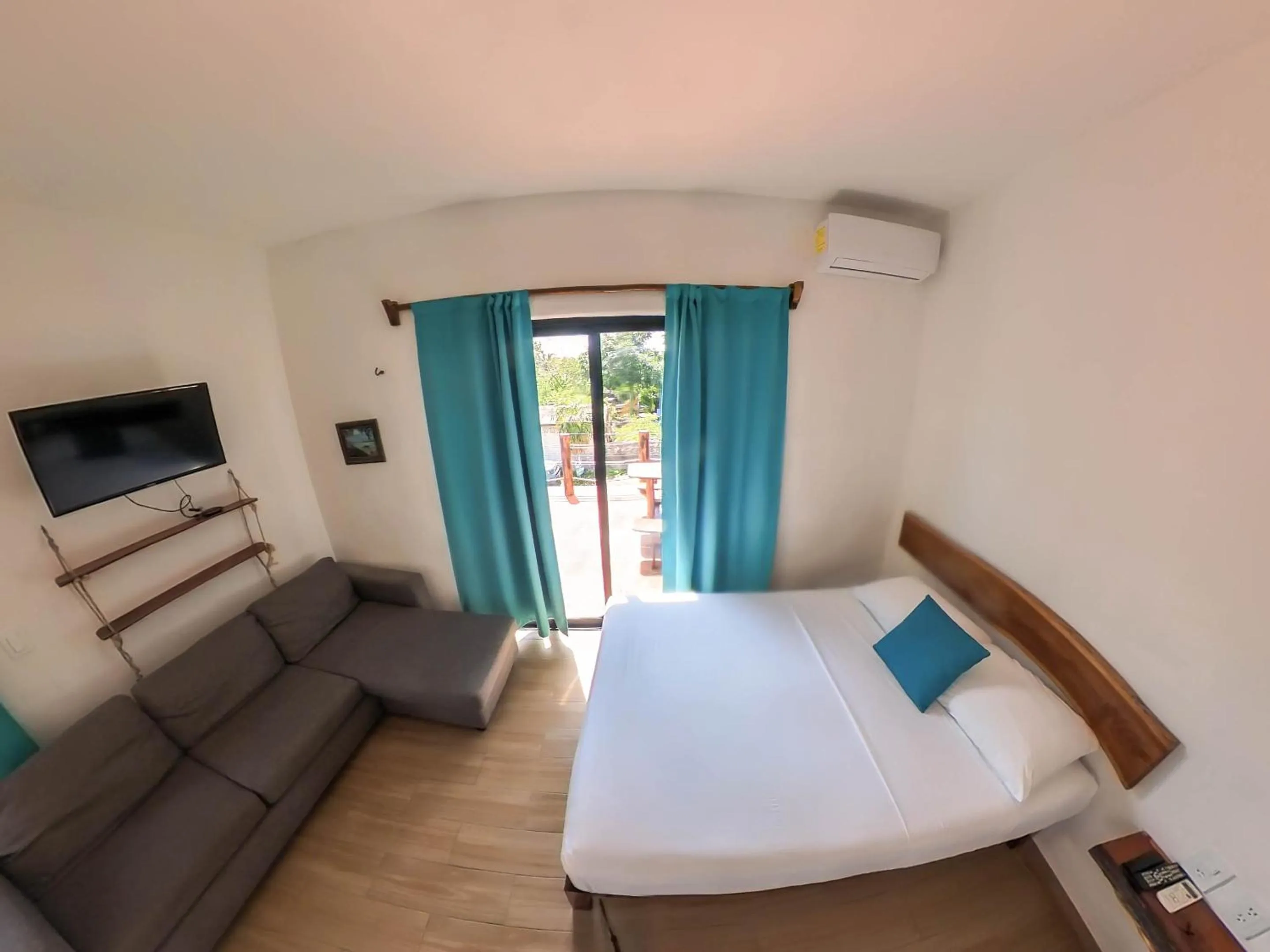 Bed in Ade Hotel Bacalar