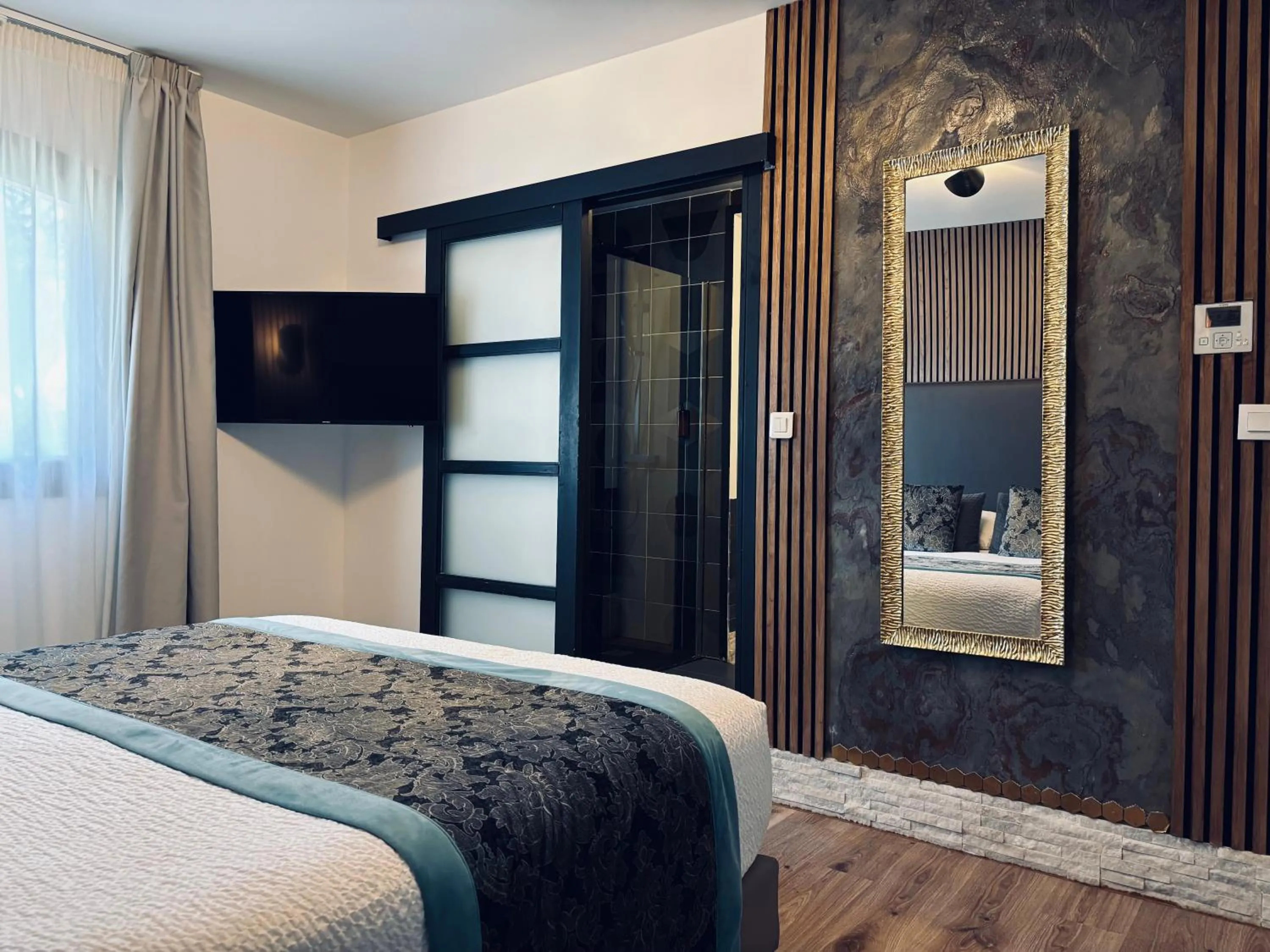 Bedroom in Le Confidentiel Hôtel & SPA