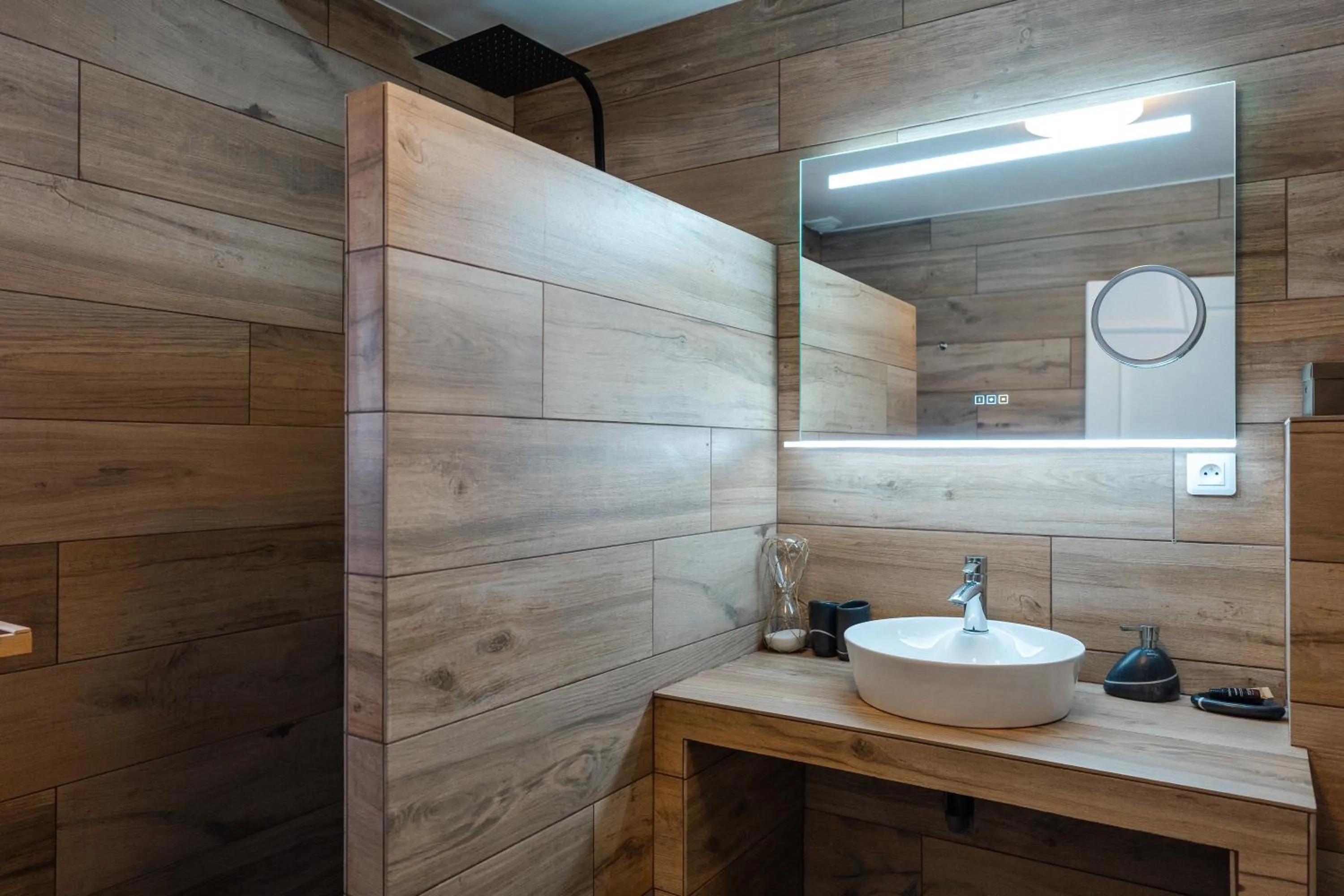 Bathroom in Le Confidentiel Hôtel & SPA