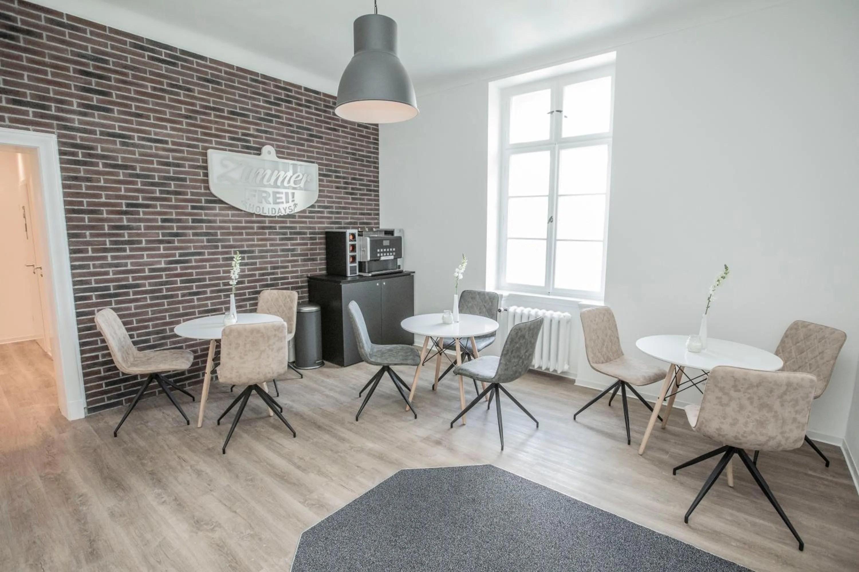 Seating area in Boardinghouse Flensburg - by Zimmer FREI! Holidays