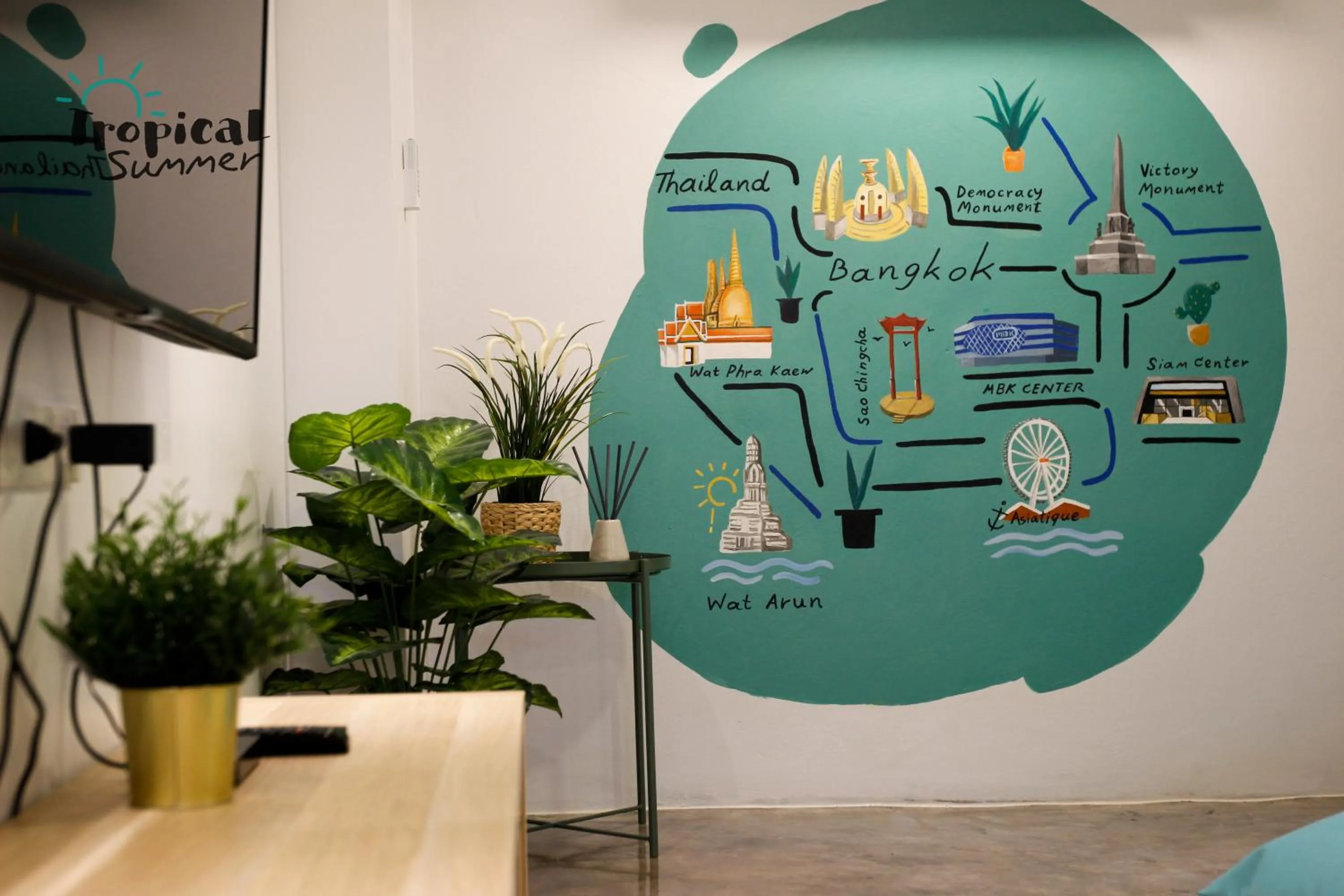 Communal lounge/ TV room in Tropical Summer Hostel