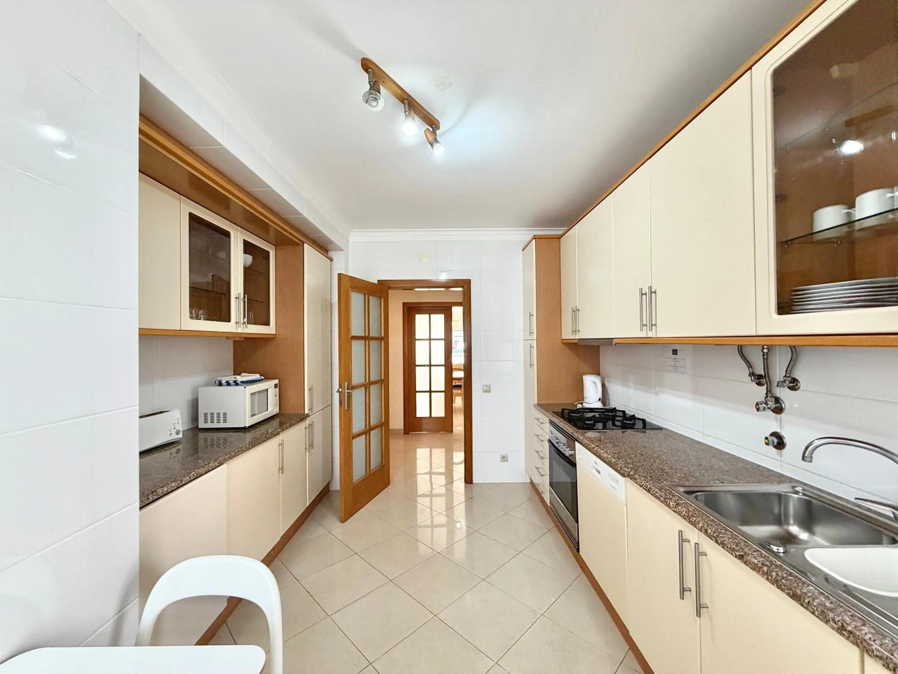 Kitchen or kitchenette in MouraPraia By Garvetur