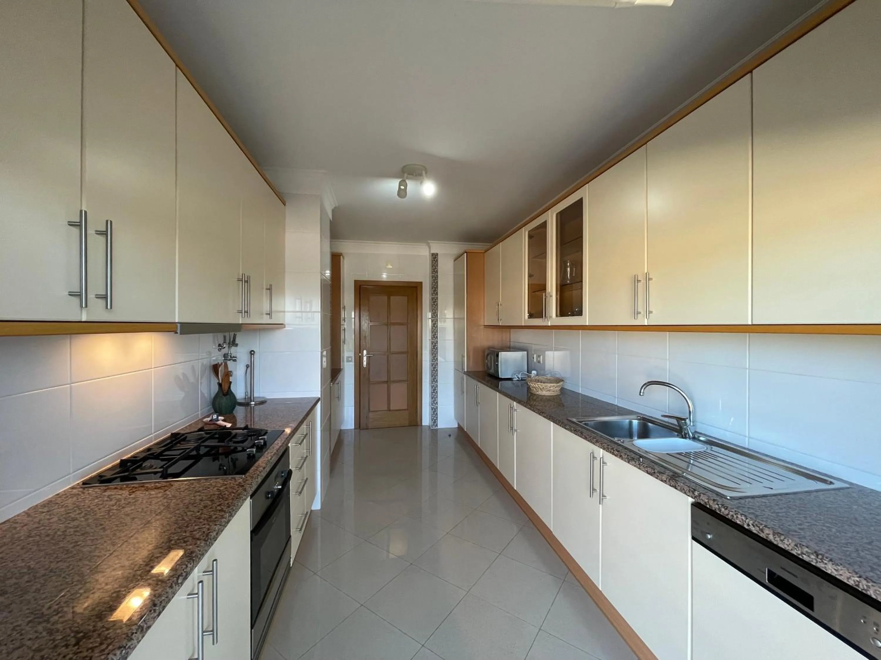 Kitchen or kitchenette in MouraPraia By Garvetur