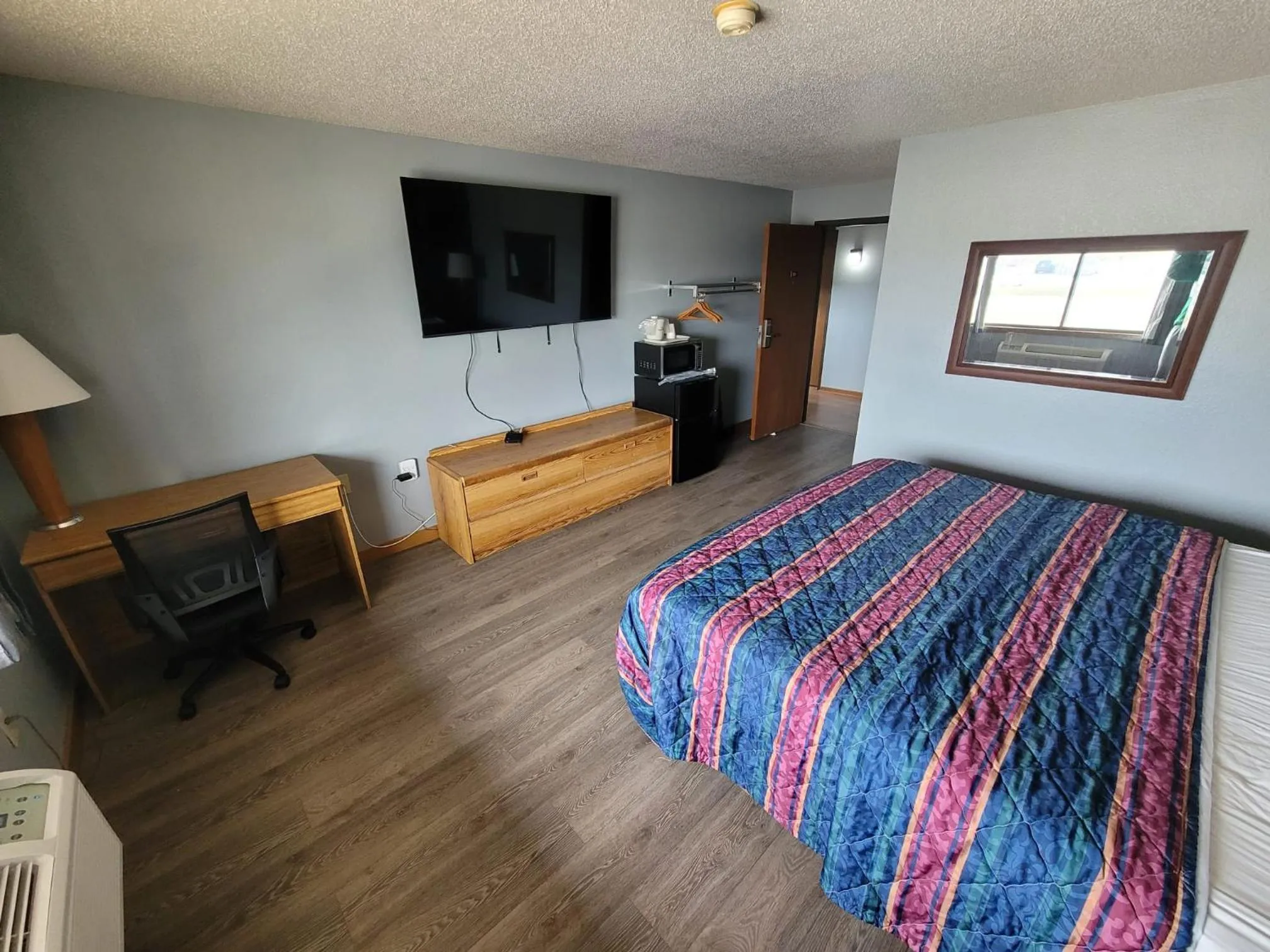 Bed in The Belgium Inn & Suites