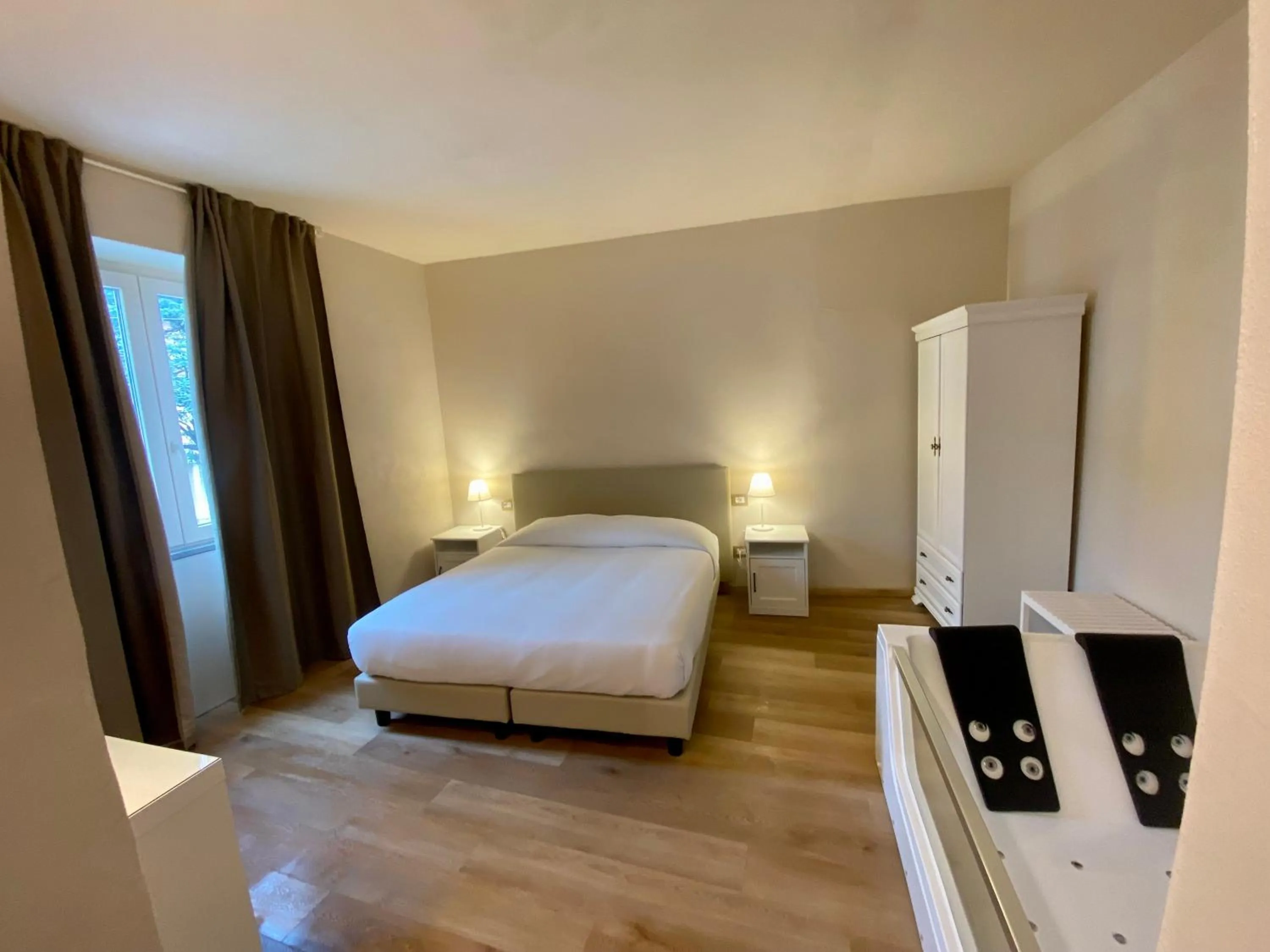 Bed in Il Tiglio Jacuzzi&Sauna