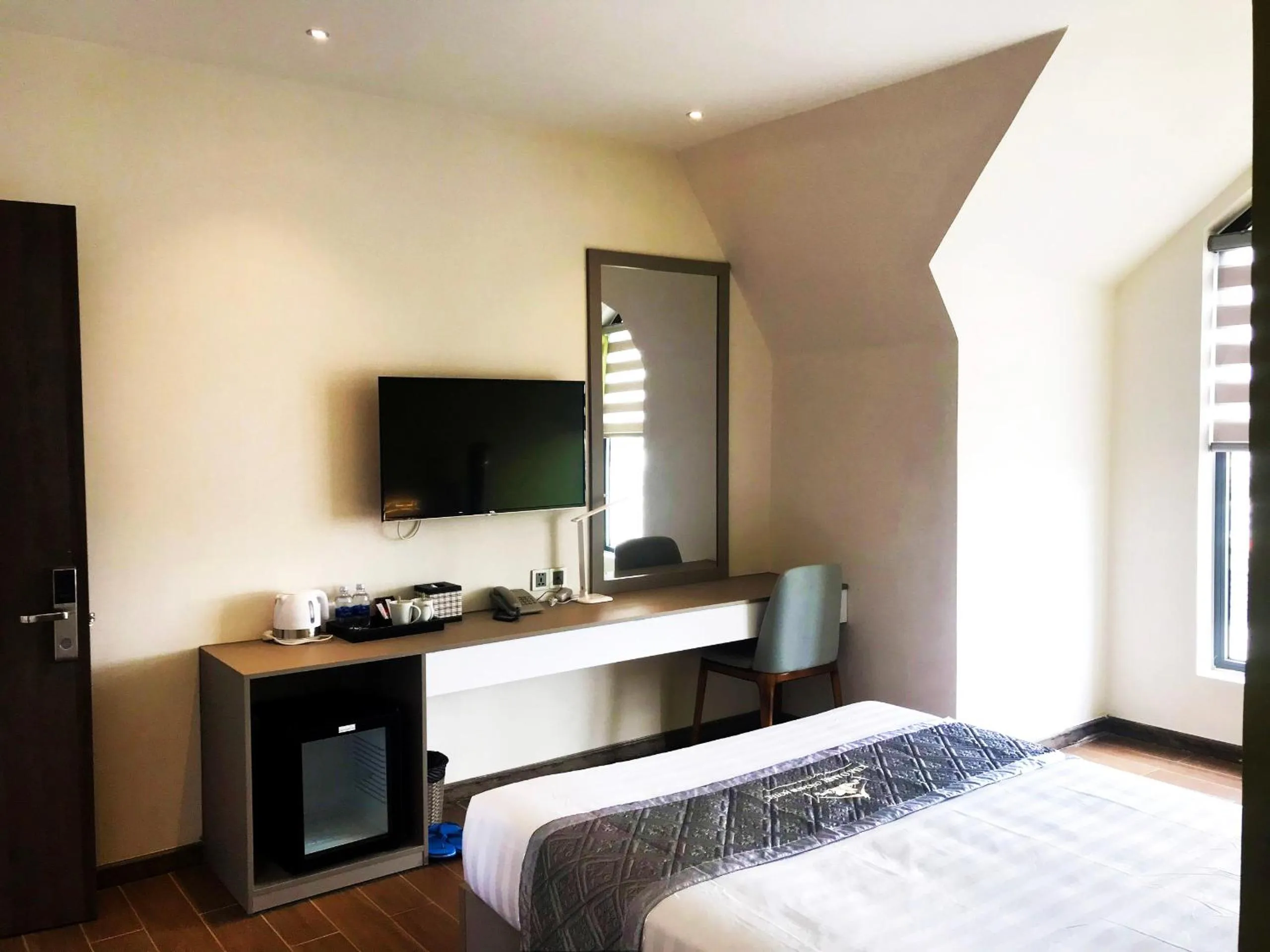 Bed in Kim Oanh Orchids Hotel