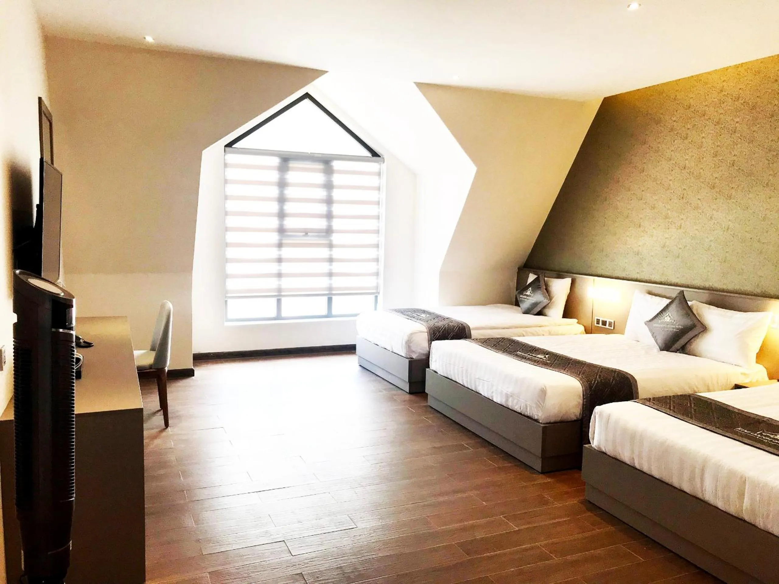 Bed in Kim Oanh Orchids Hotel