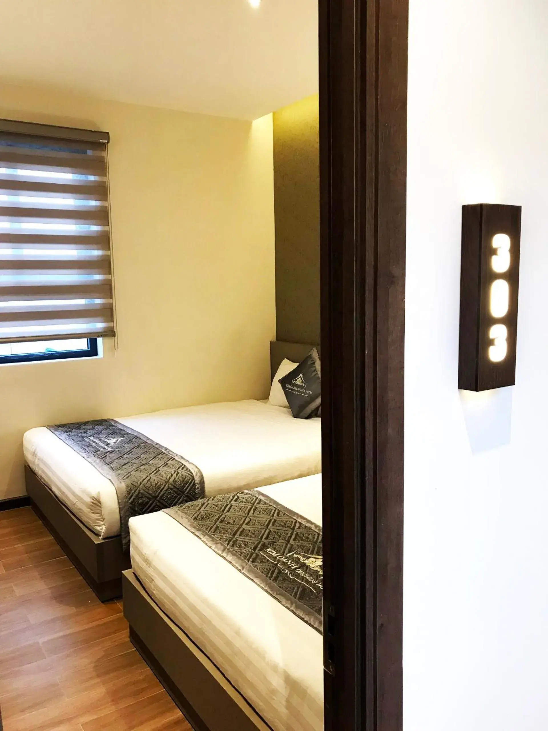 Bed in Kim Oanh Orchids Hotel Bed in Kim Oanh Orchids Hotel