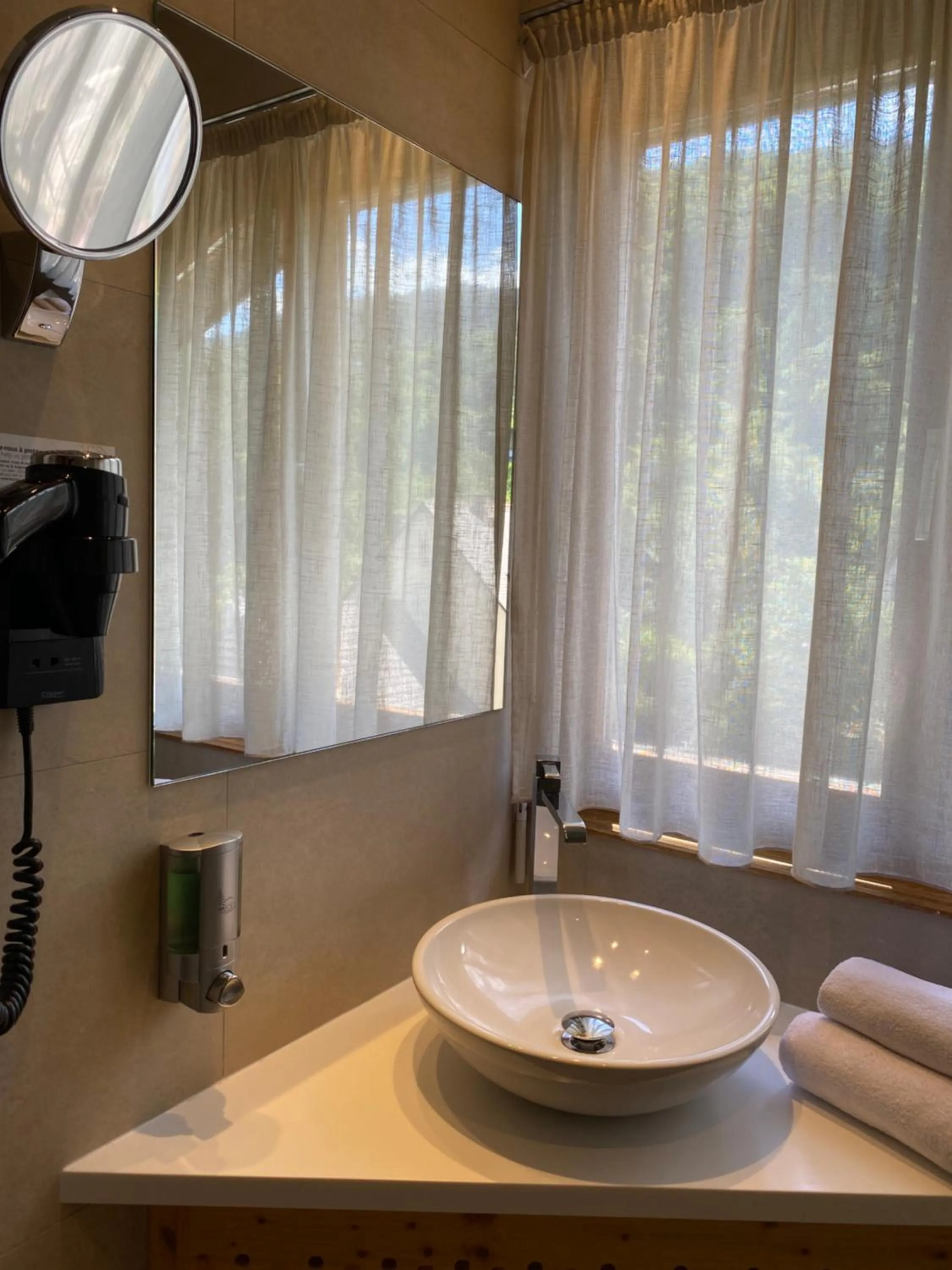 Bathroom in LE CLOS DES SOURCES Hôtel & Spa