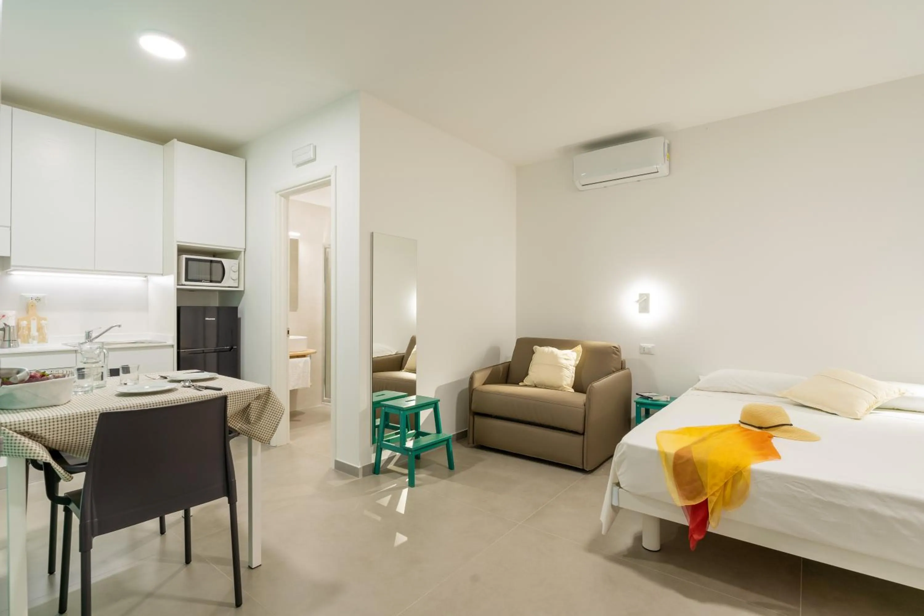 Bed in SMERALDO RESIDENCE