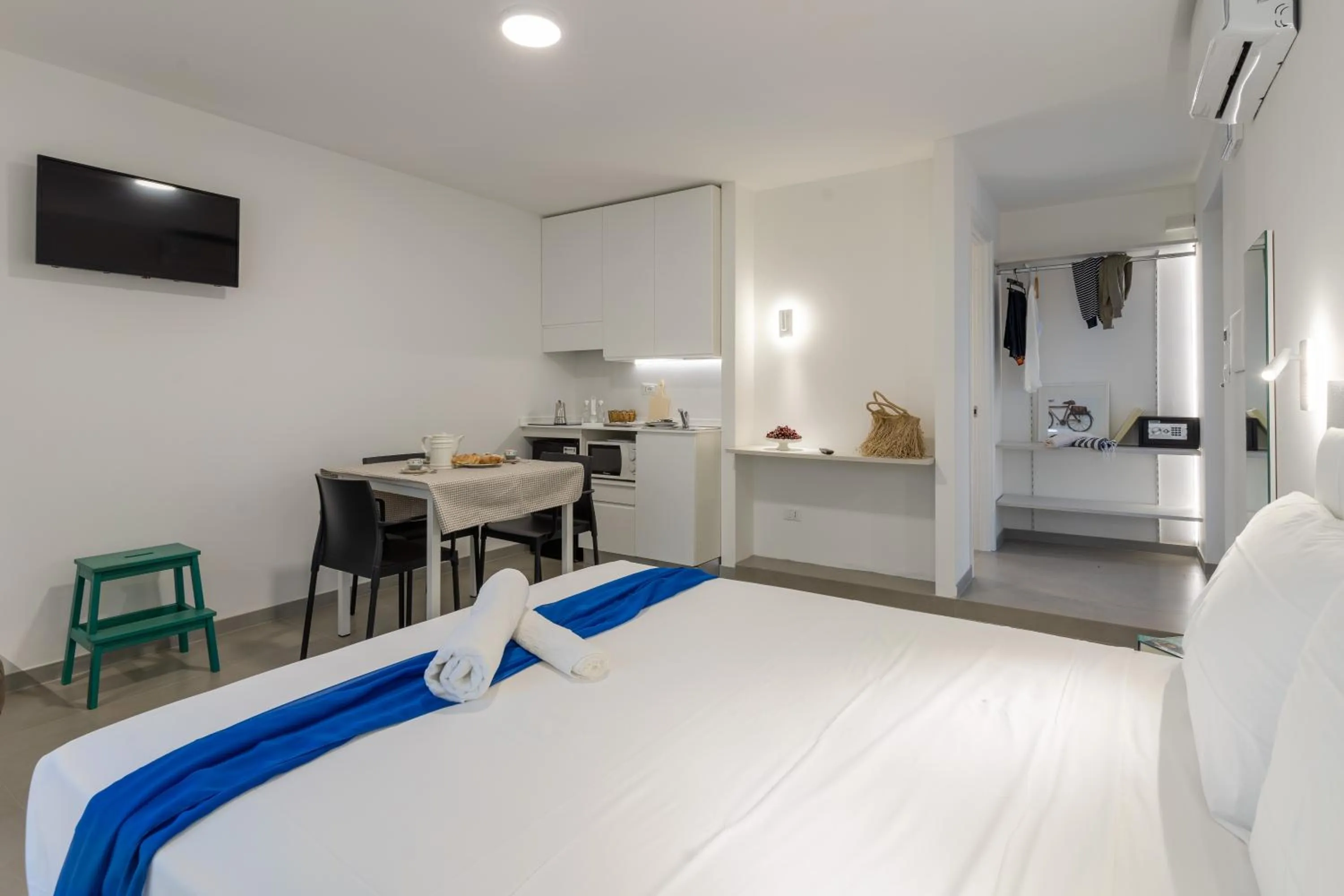 Bed in SMERALDO RESIDENCE