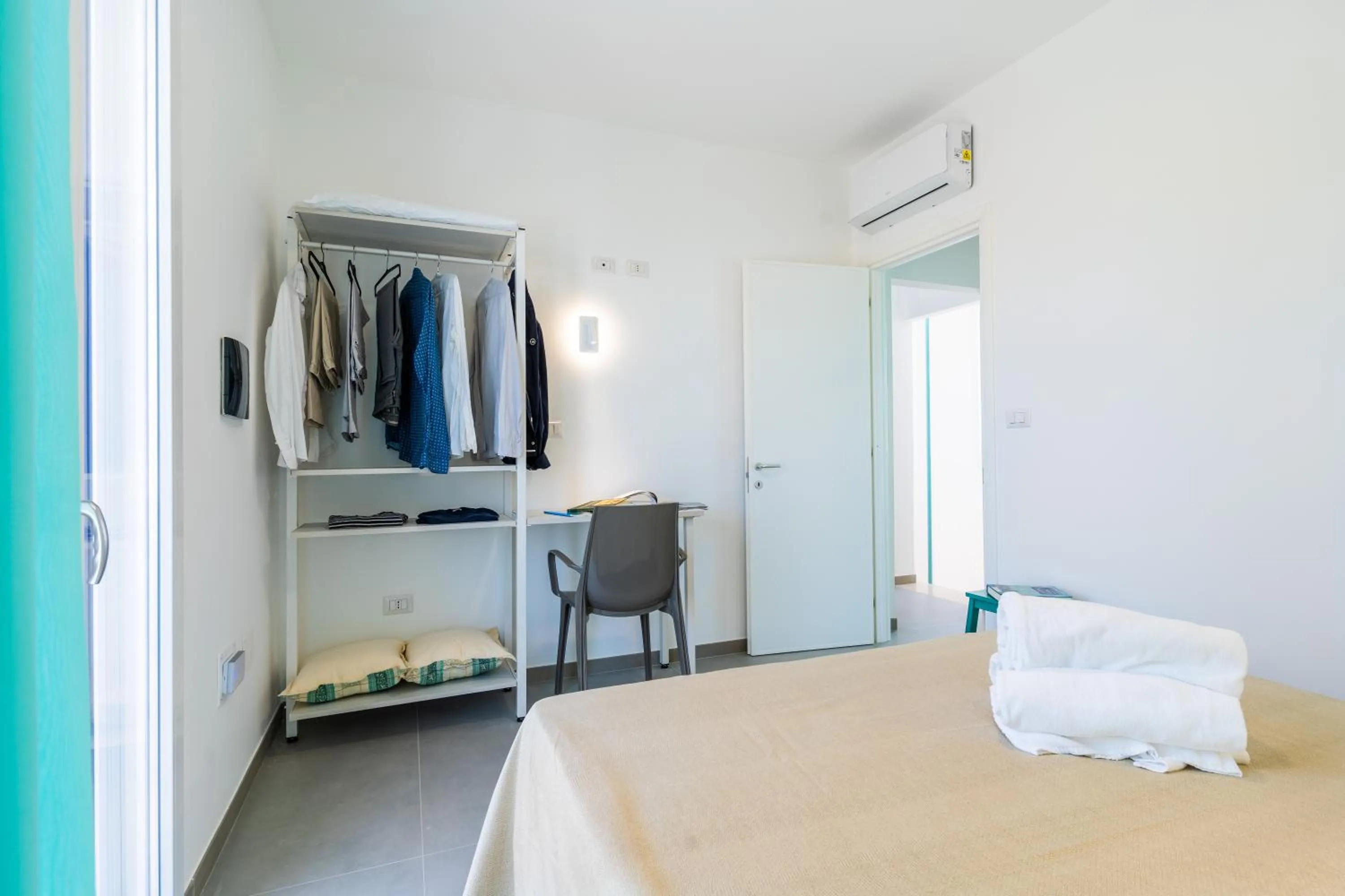 Bed in SMERALDO RESIDENCE