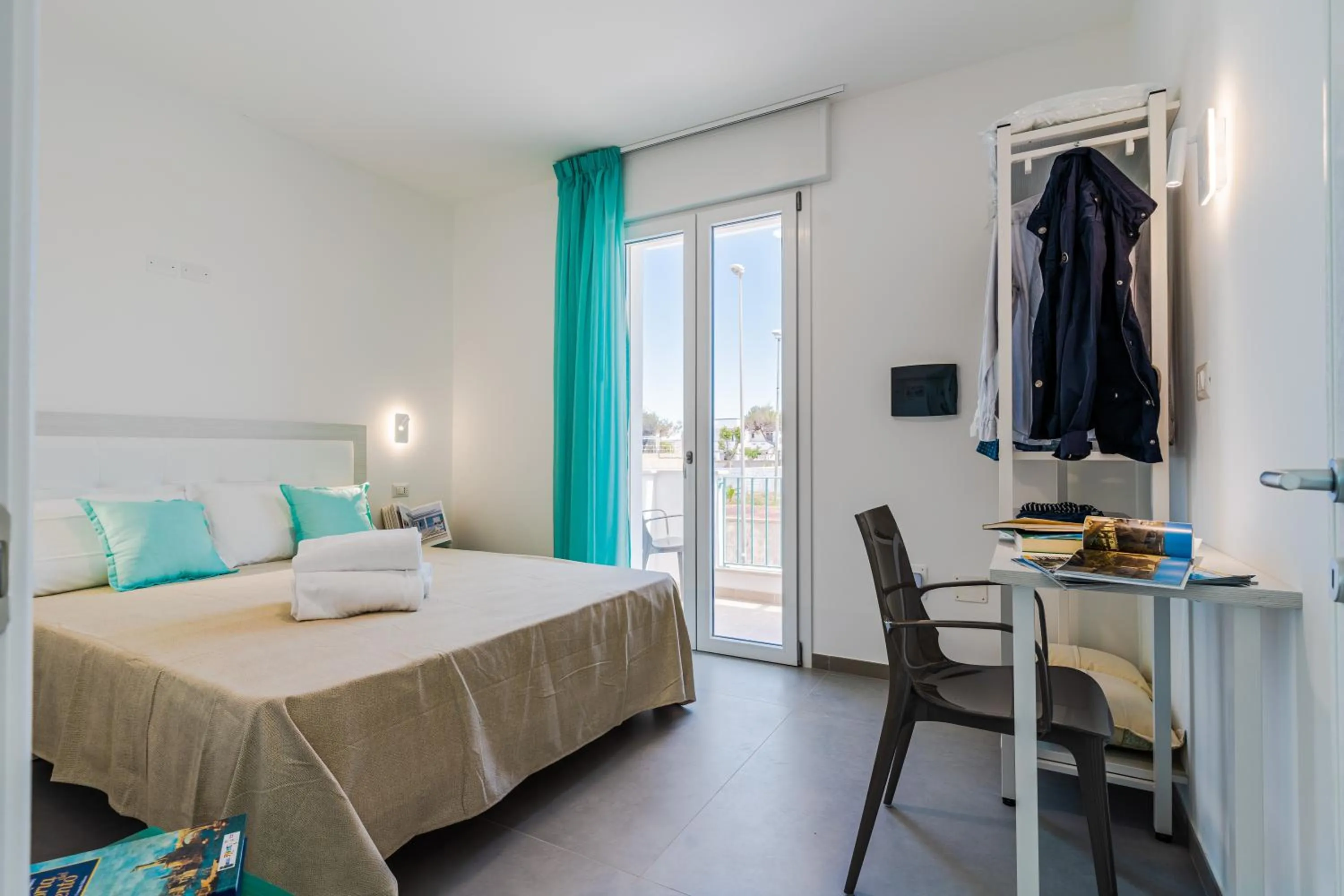 Bed in SMERALDO RESIDENCE