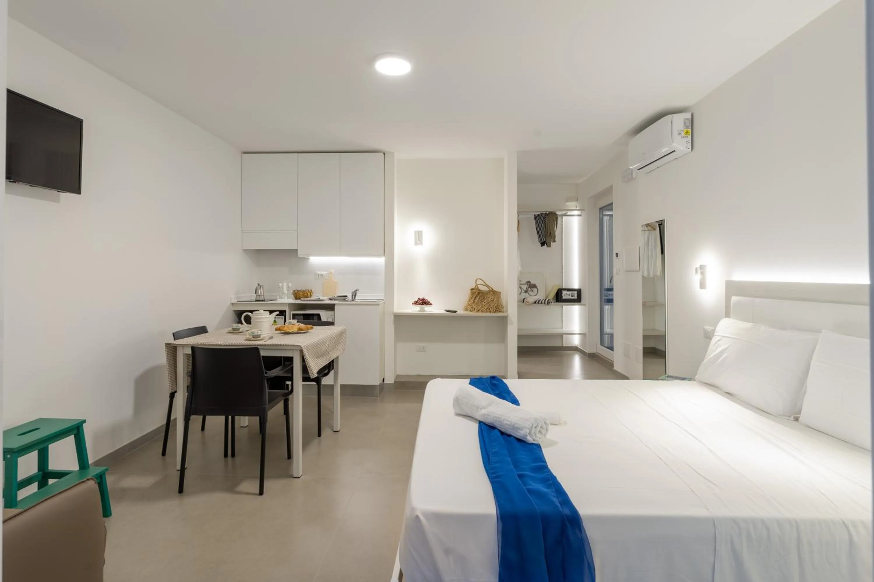 Bed in SMERALDO RESIDENCE