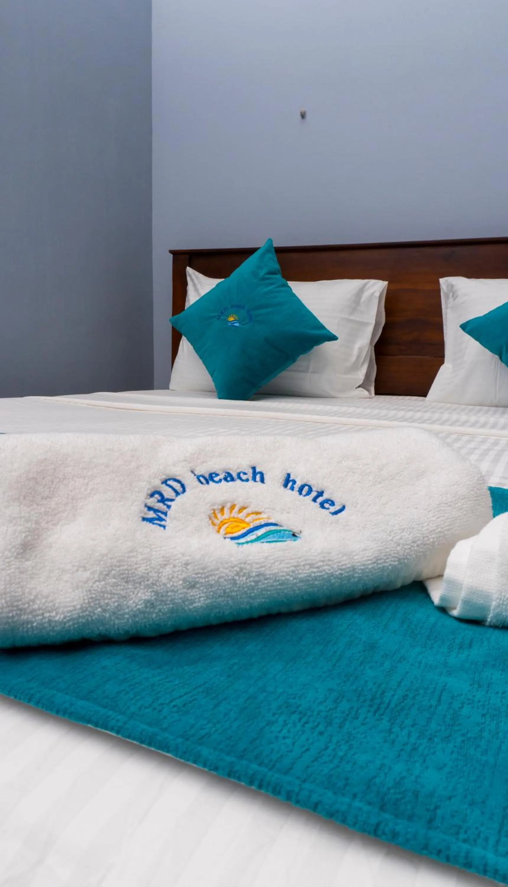 Bed in MRD Beach Hotel