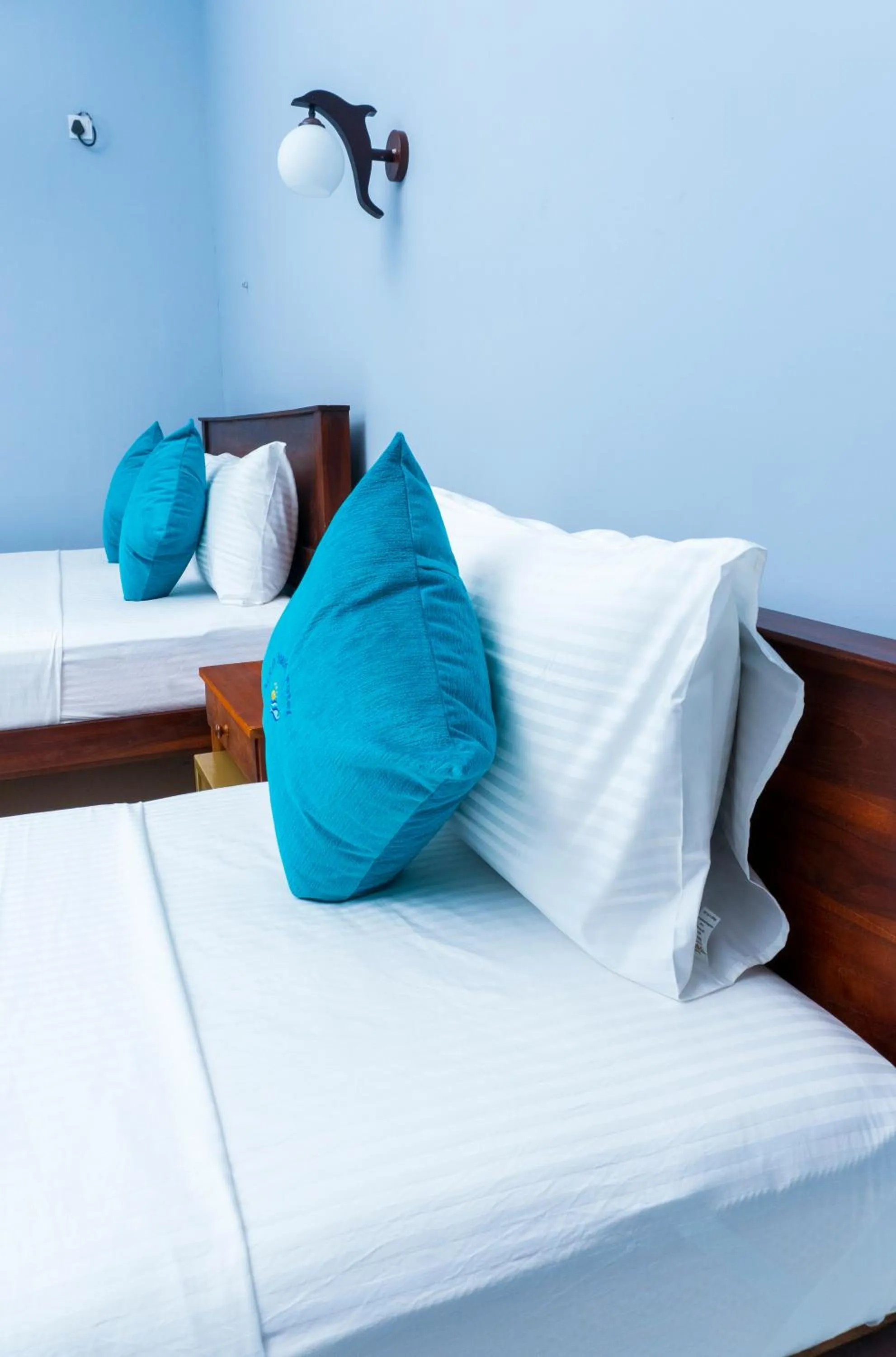 Bed in MRD Beach Hotel