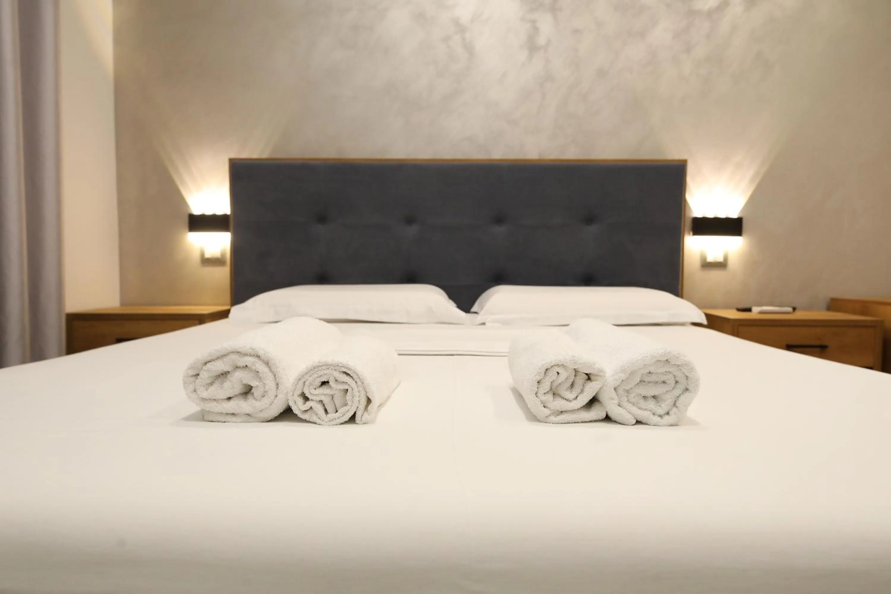 Bed in Hotel Salvadore