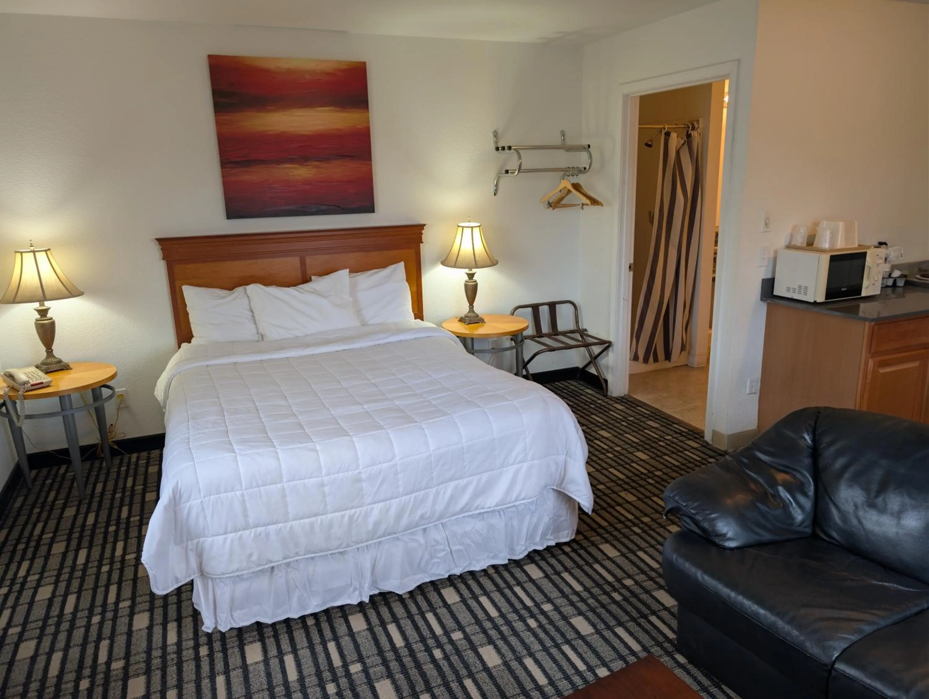 Bed in Ponderosa Motel