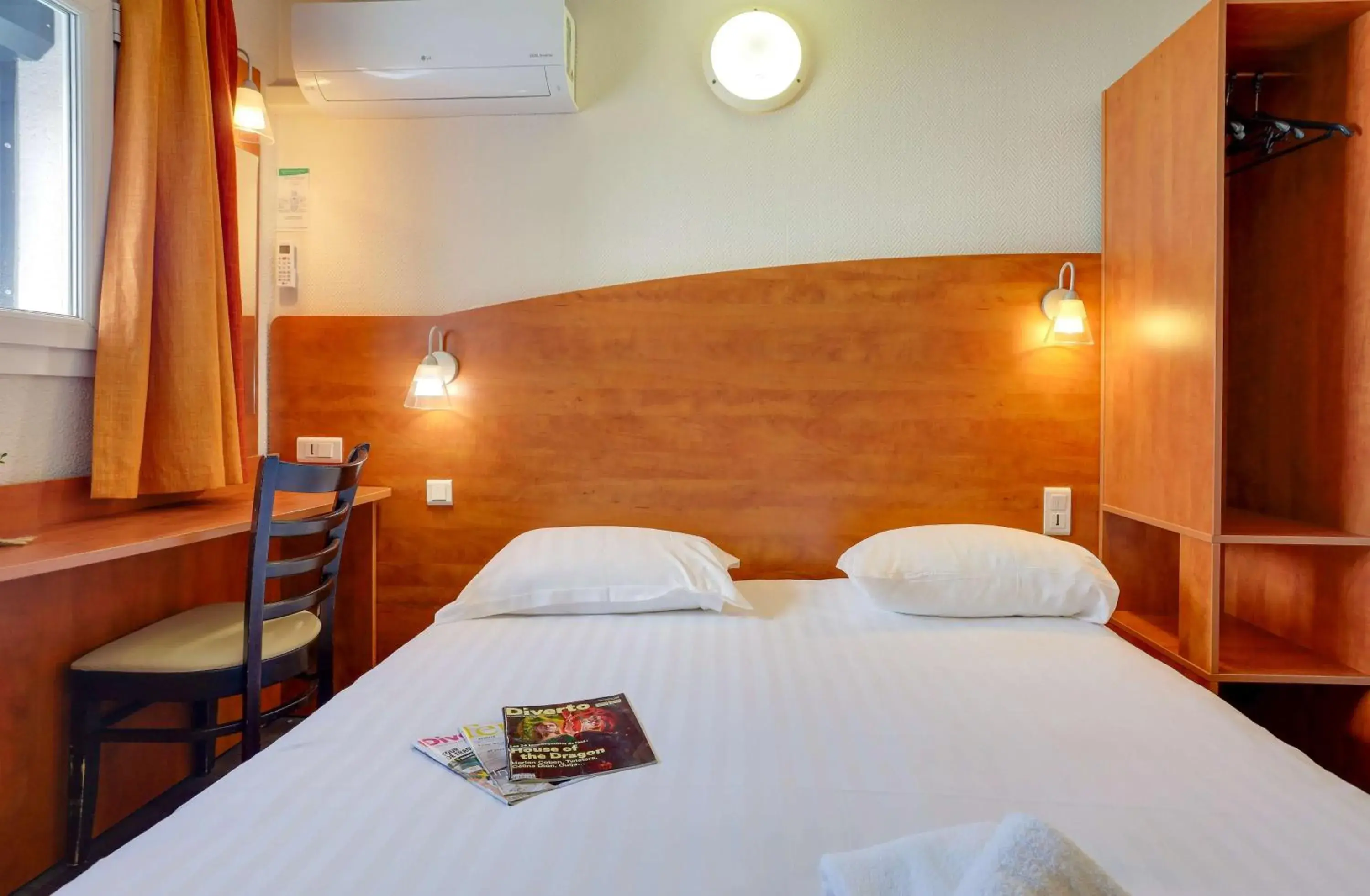 Bedroom, Bed in Brit Hotel Reims La Pompelle Bedroom, Bed in Brit Hotel Reims La Pompelle