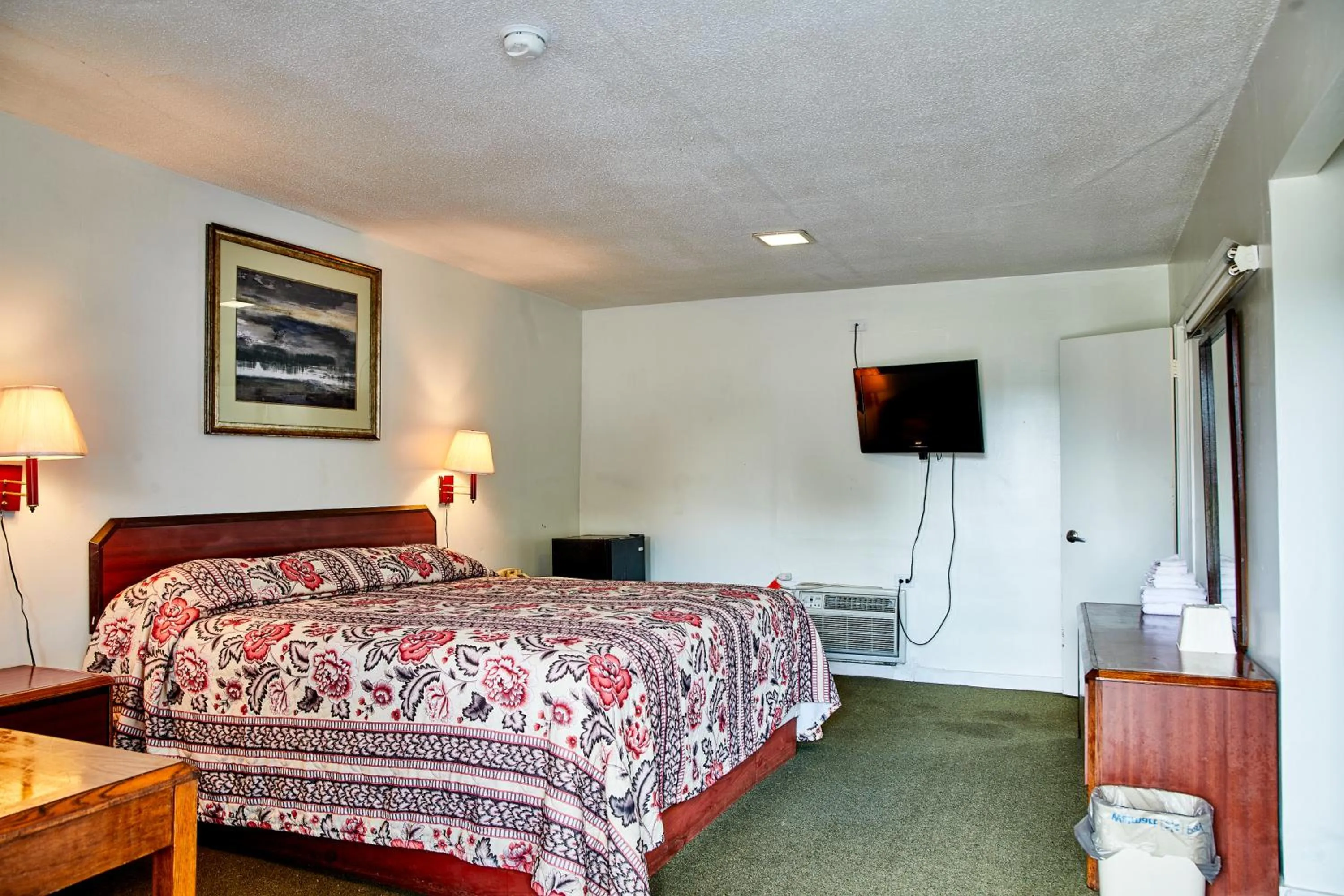 Bedroom in Hospitality Inn