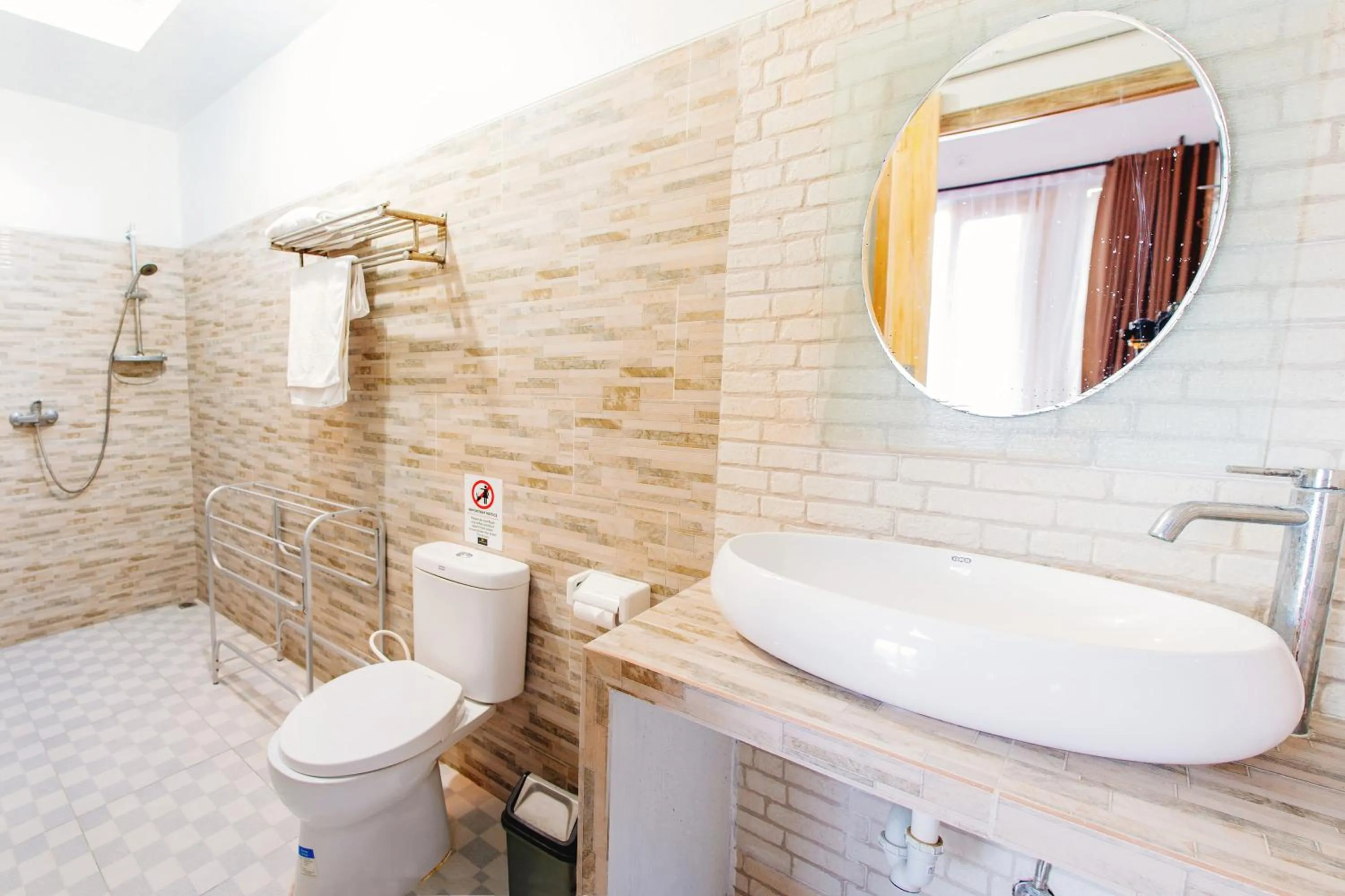 Bathroom in Kayu Kuning Cottage