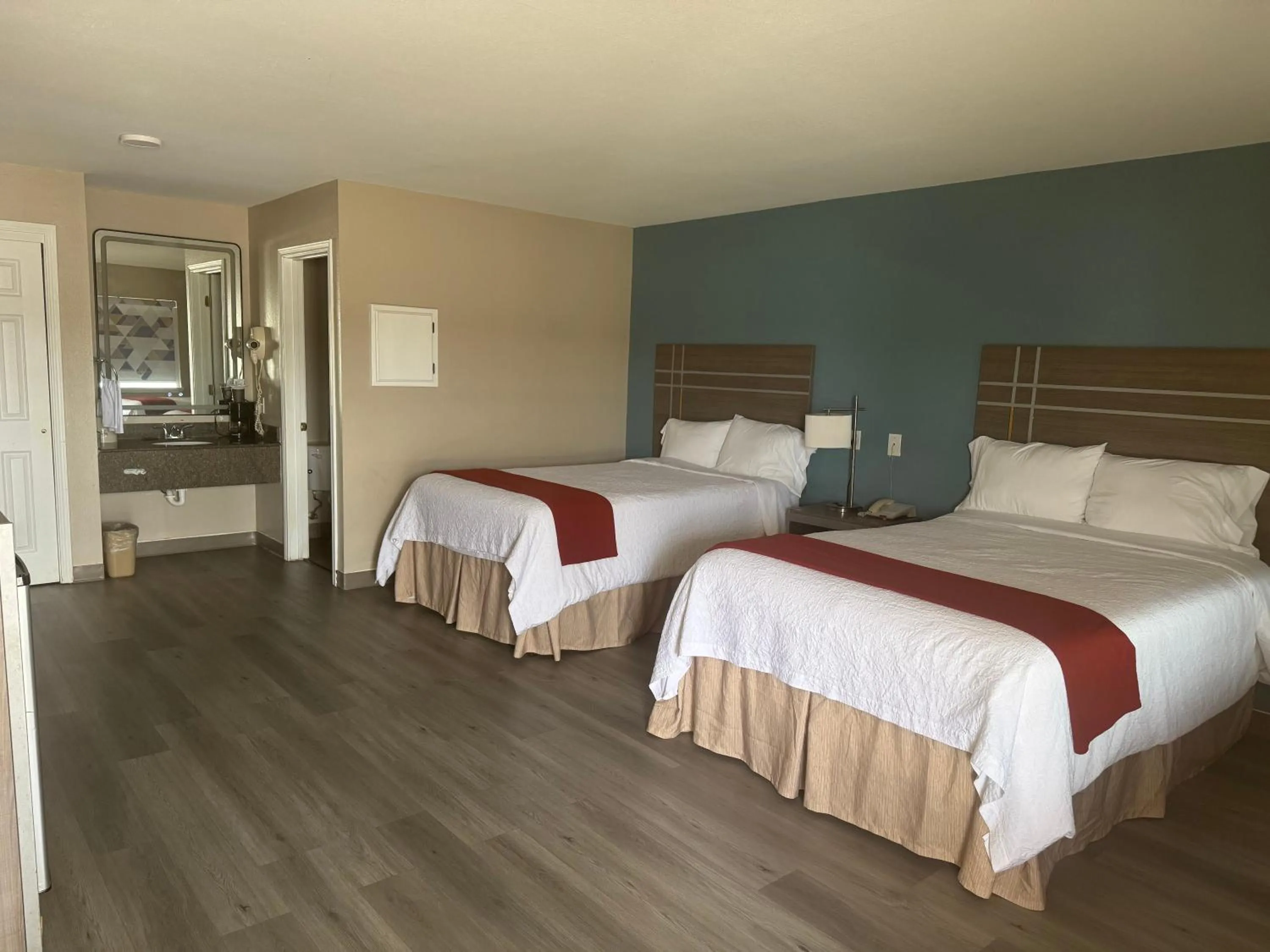 Bed in Deluxe Inn Palacios