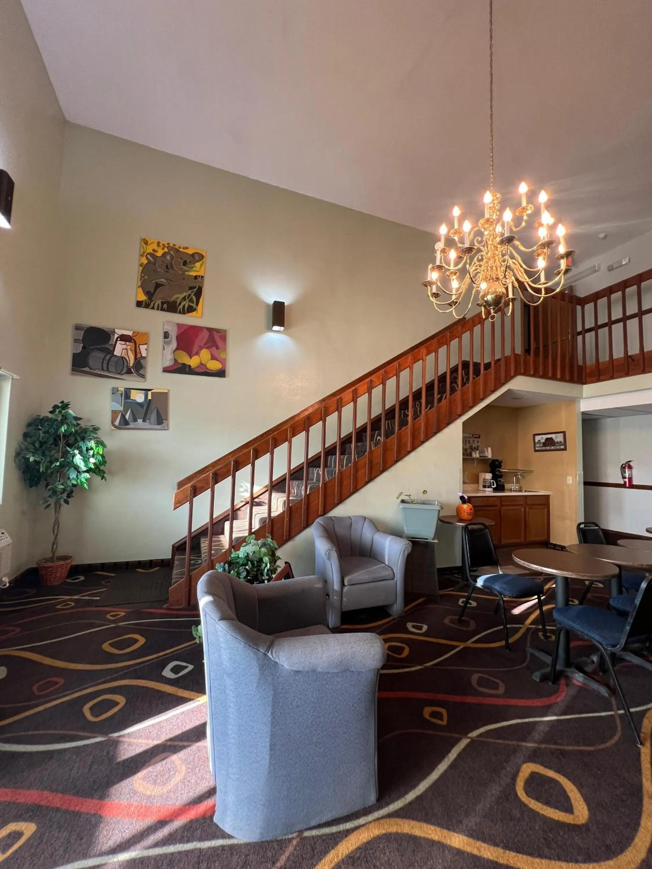 Seating area in Deluxe Inn Capital O Nebraska City I 29