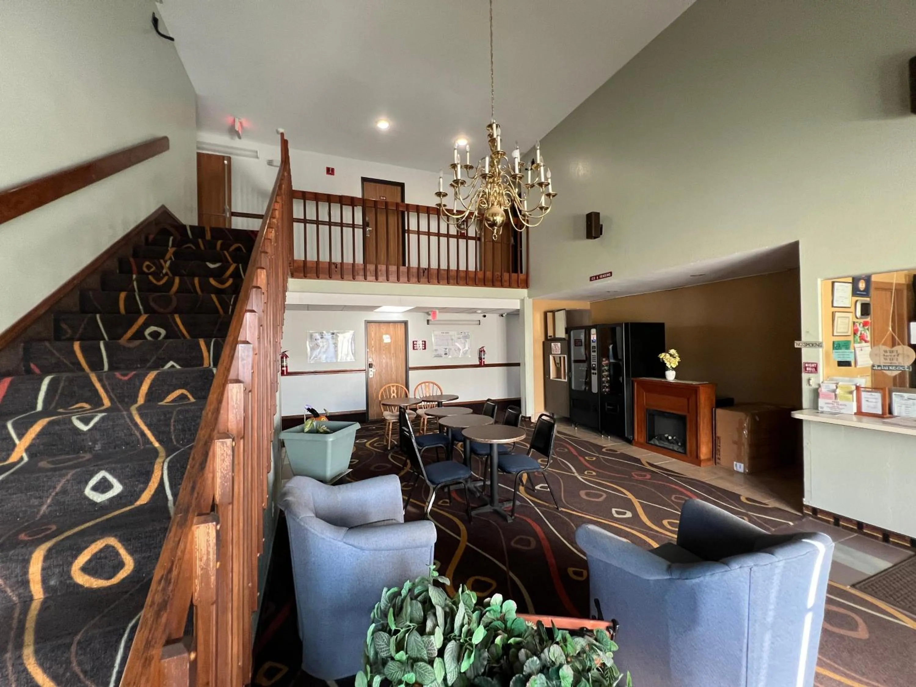 Seating area in Deluxe Inn Capital O Nebraska City I 29