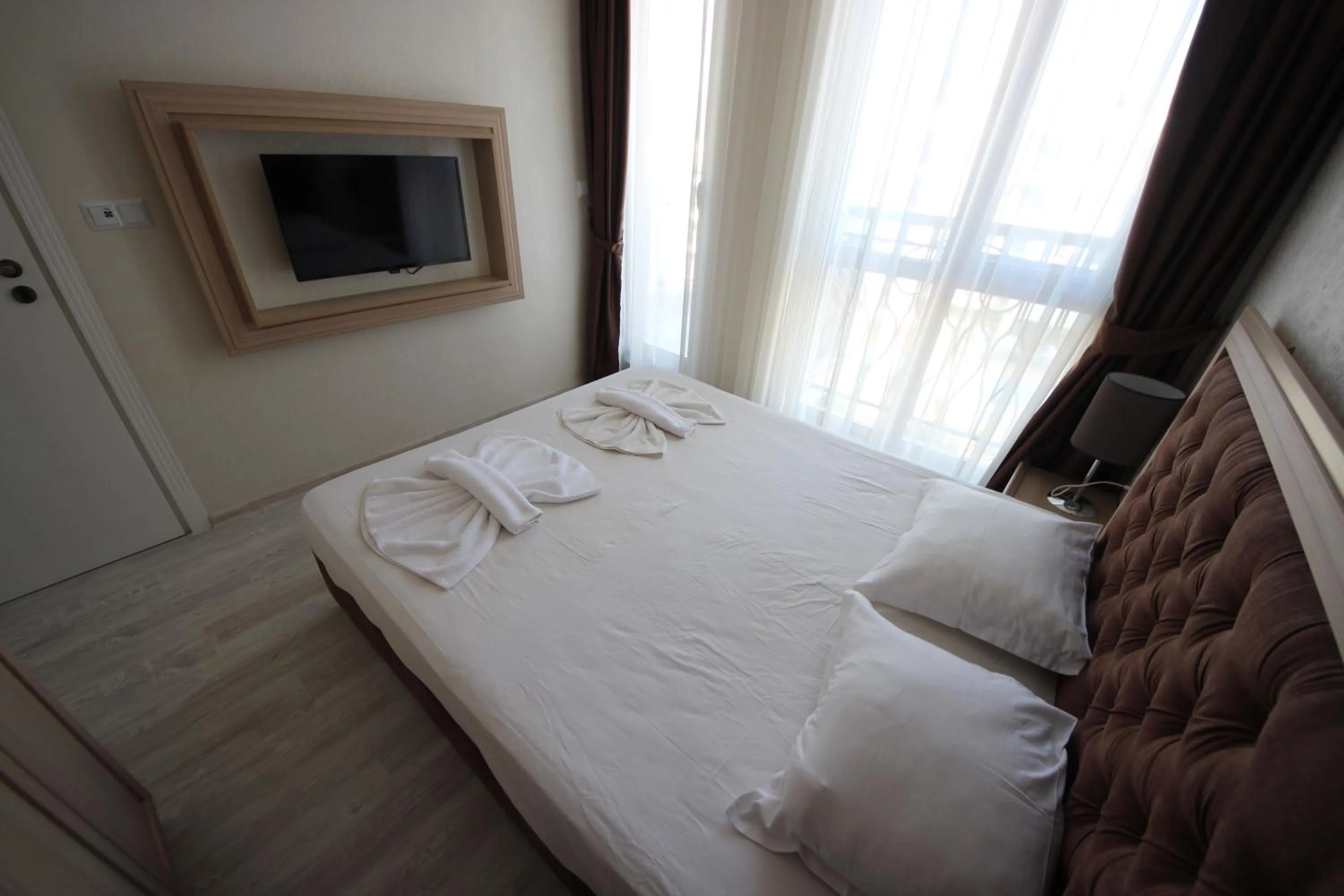 TV and multimedia, Bed in Menada Harmony Suites X