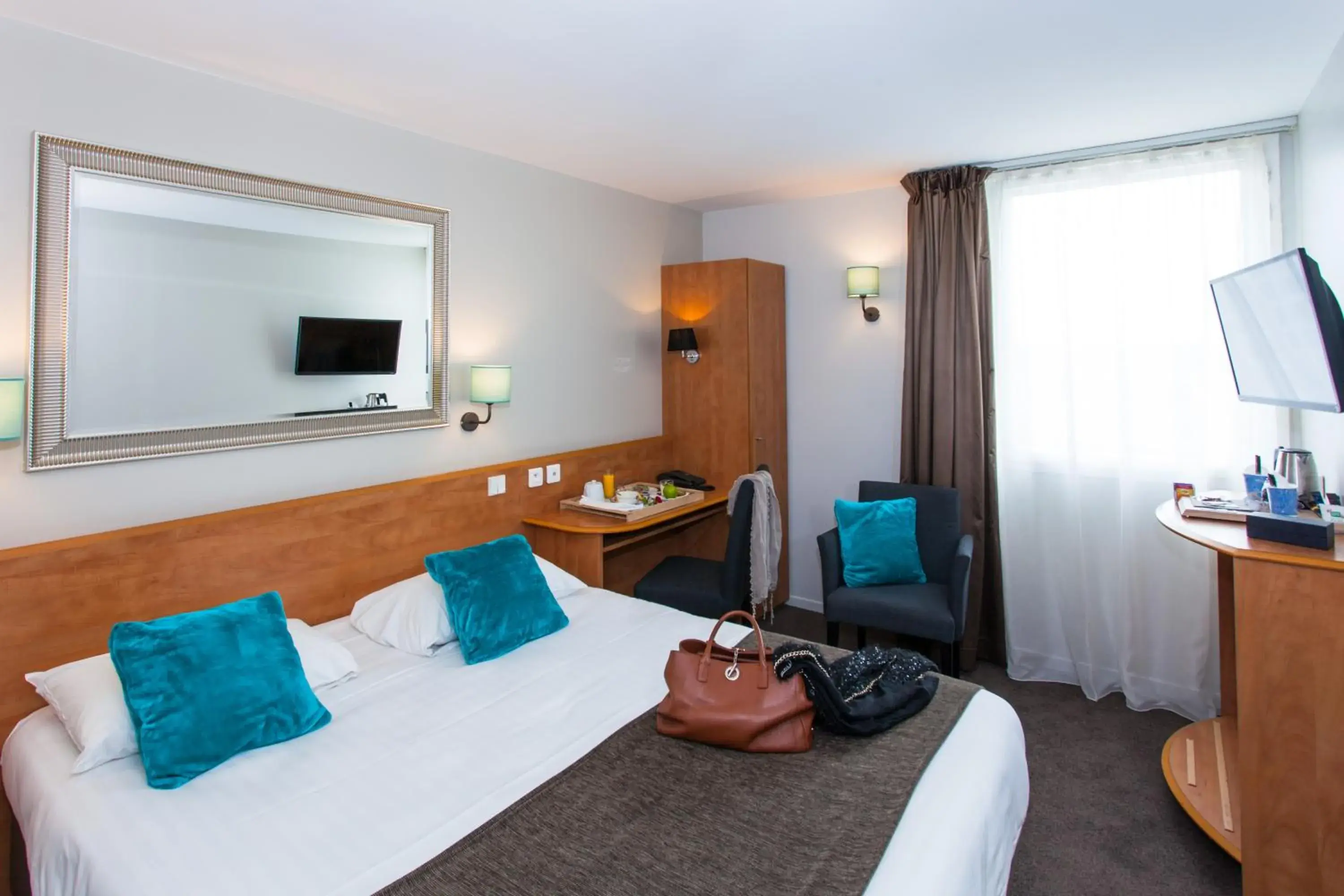 Bedroom in HOTEL DU PARC Roissy Villepinte - Parc des Expositions