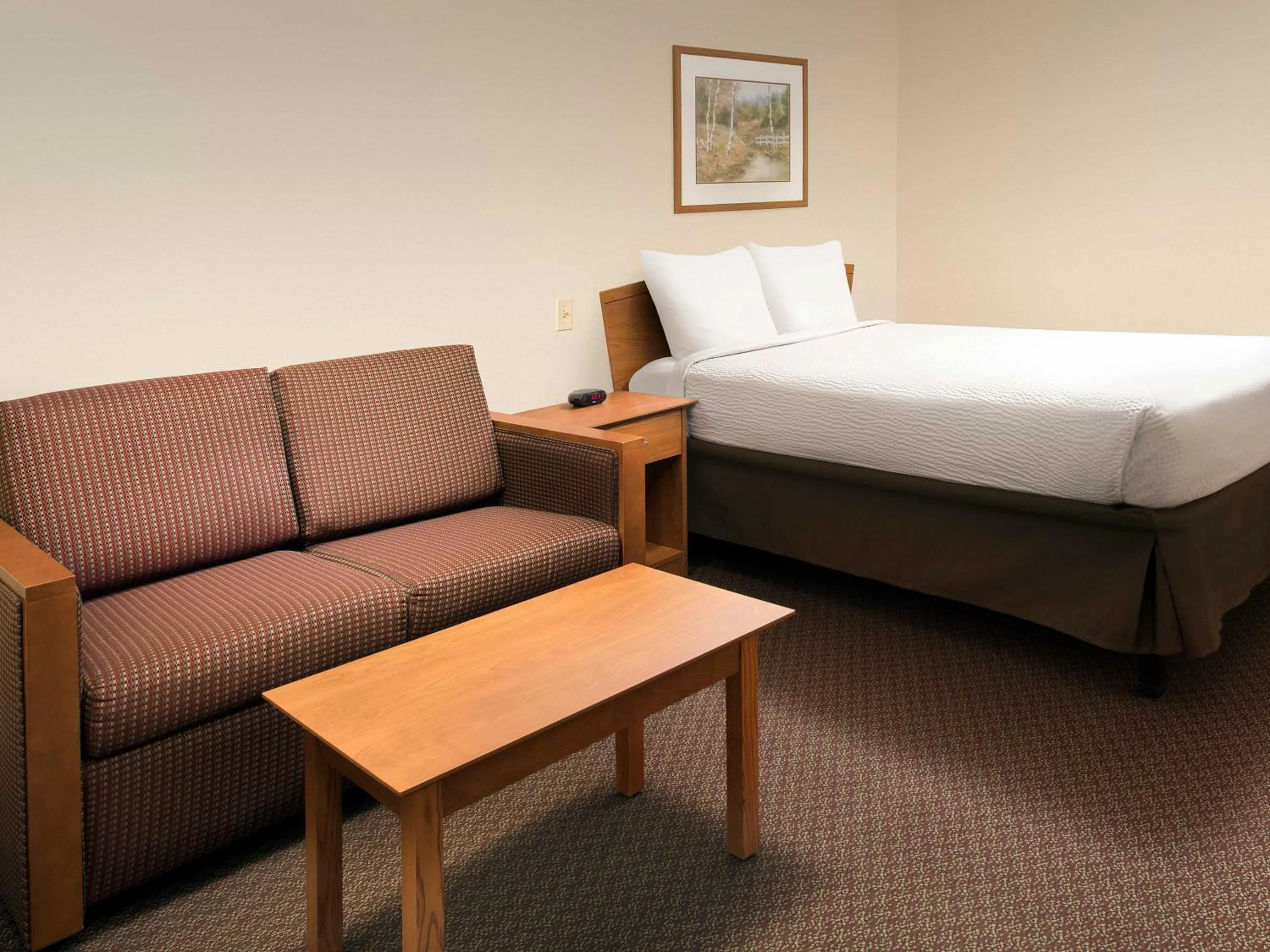 Bedroom, Bed in WoodSpring Suites Midland