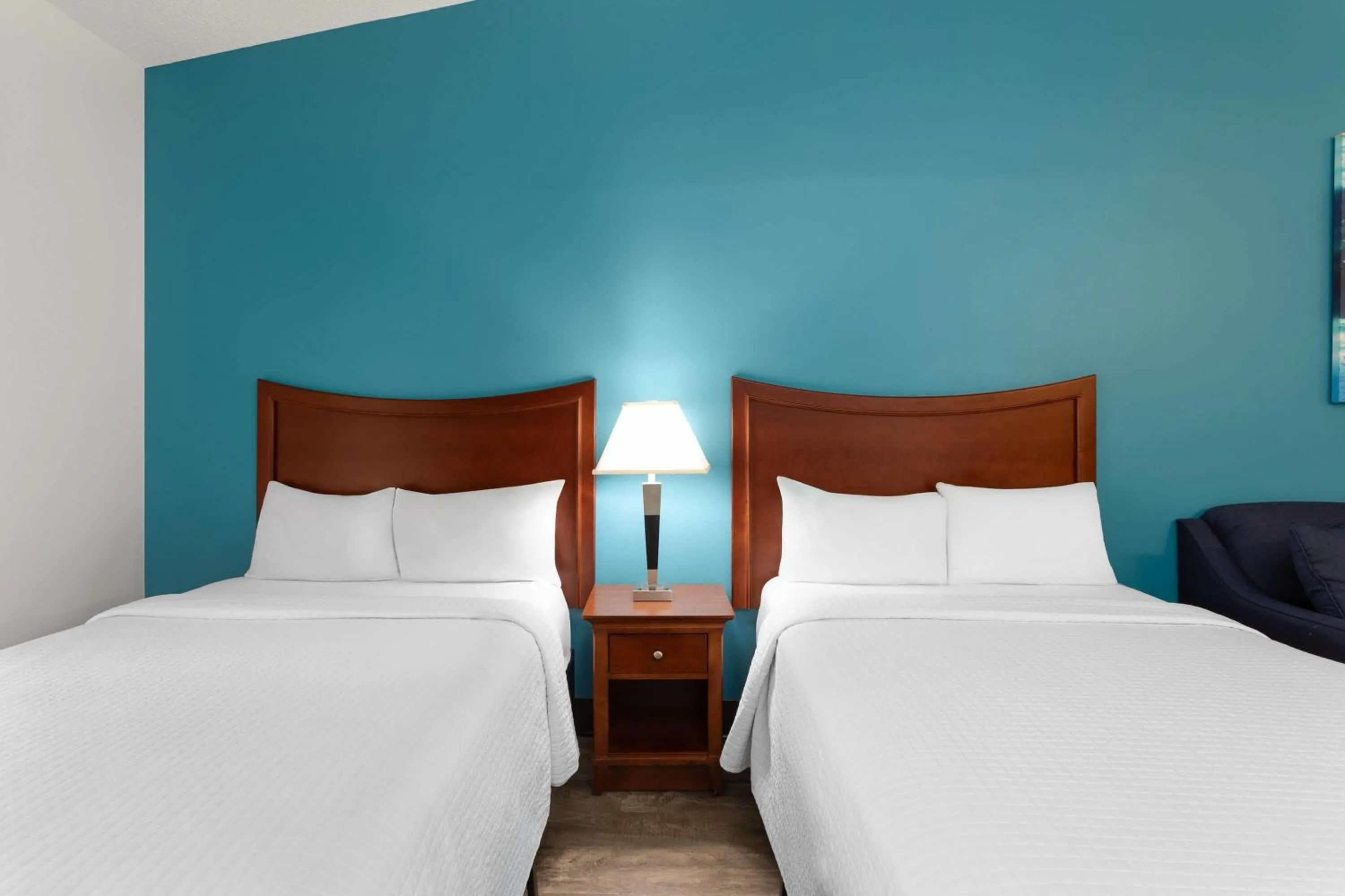 Photo of the whole room, Bed in PaddleTail Waterfront Lodge, Trademark Collection by Wyndham