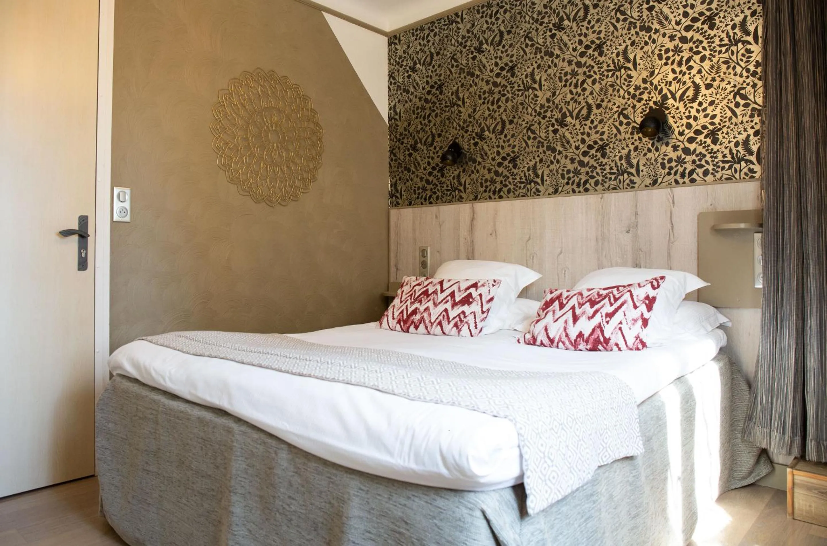 Bed in Hôtel La Casa Pairal