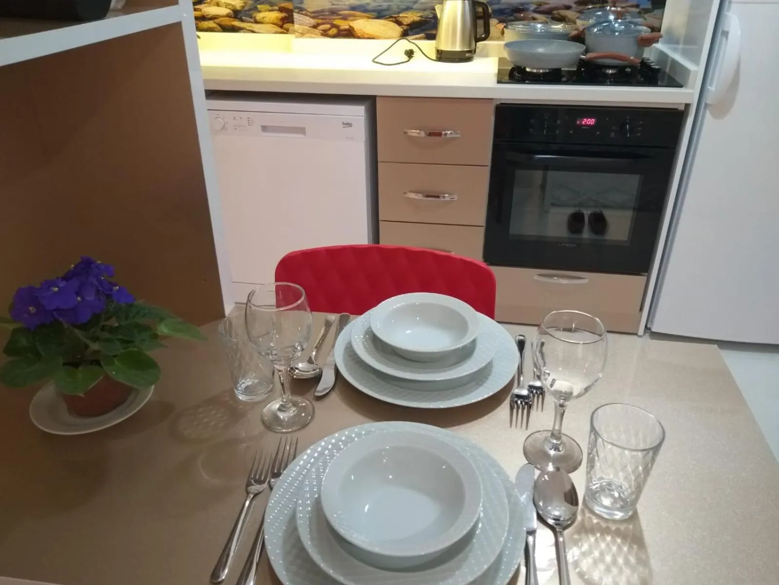 Communal kitchen in Sare Suites Downtown