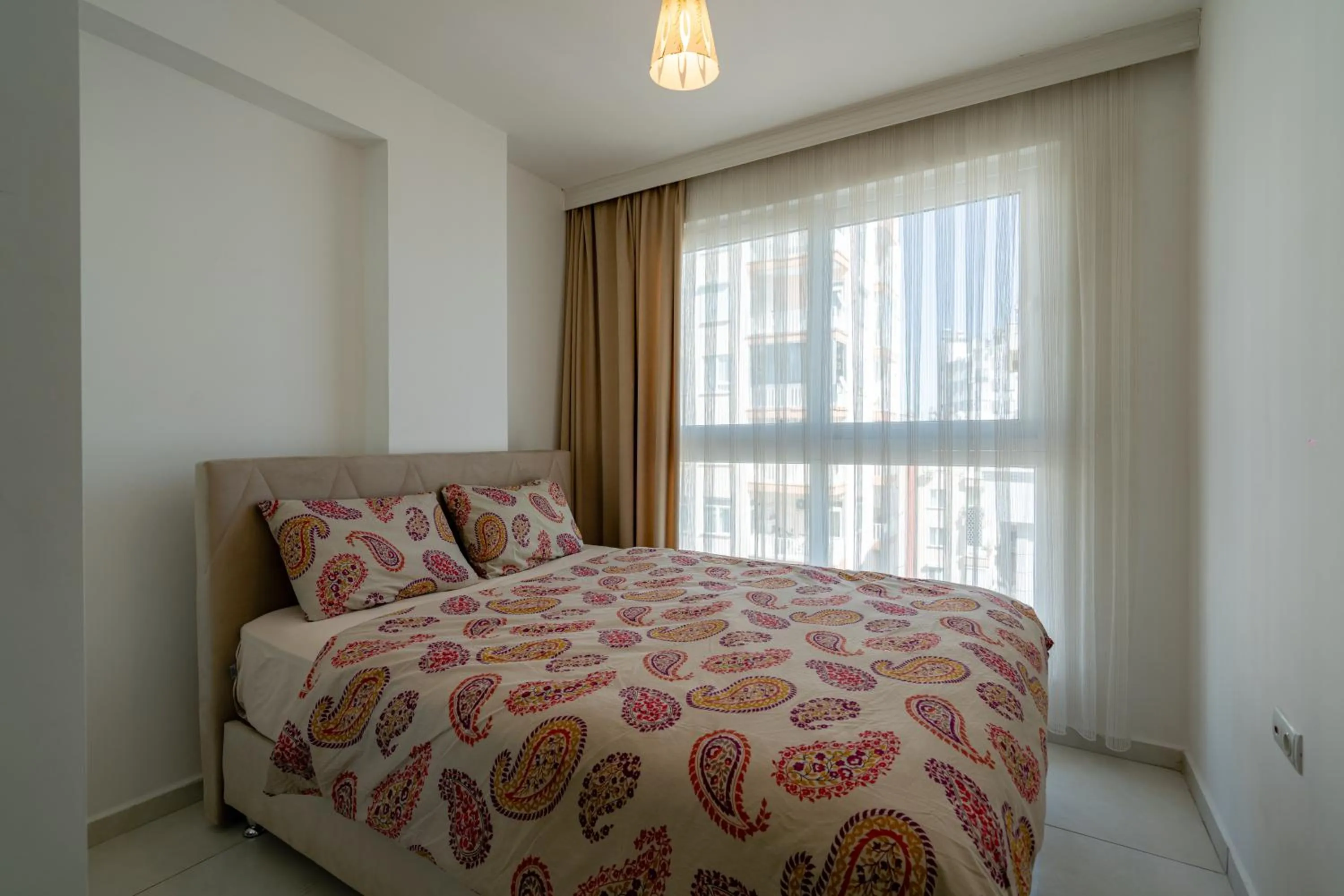 Bed in Sare Suites Downtown